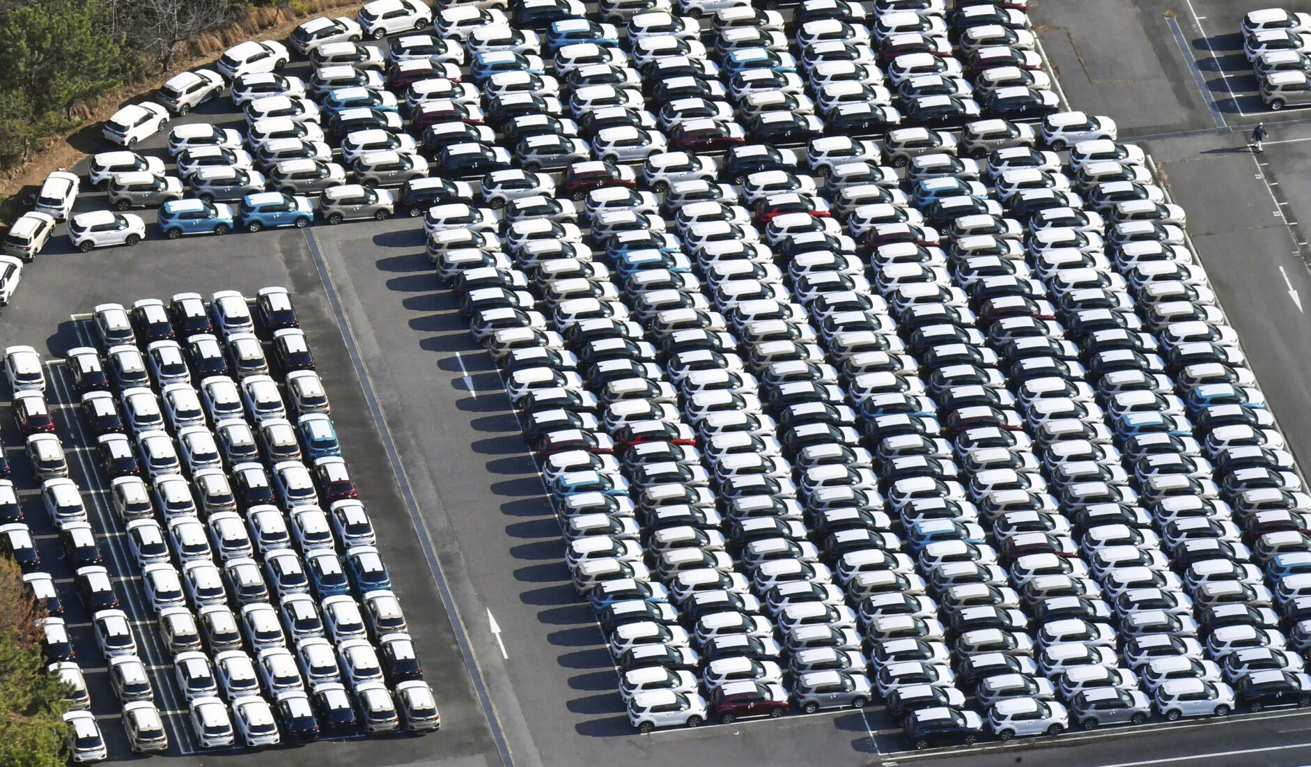 <p>In this aerial photo, cars are seen in a Daihatsu Motor Co. factory in Ryuo in Shiga Prefecture, western Japan on Dec. 25, 2023. Daihatsu, a unit of Japanese automaker Toyota Motor Corp., has shut down production lines at all its four factories in Japan while transport ministry officials investigate improper tests for safety certifications. (Kyodo News via AP)</p>   PHOTO CREDIT: Kyodo News via AP