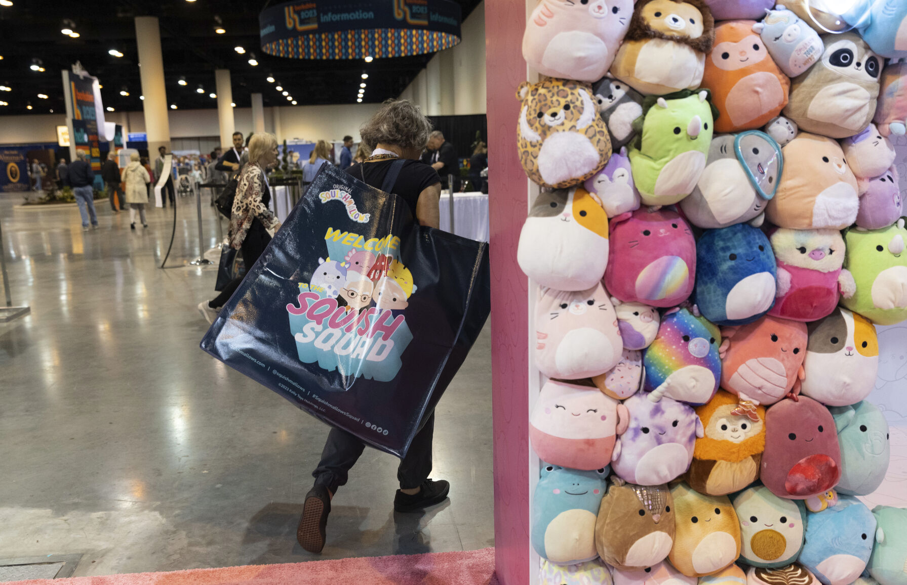 <p>FILE - A shareholder leaves the Squishmallows booth with a large bag of purchases in the exhibition hall of the Berkshire Hathaway annual meeting on Saturday, May 6, 2023, in Omaha, Neb. A judge in New York has ruled that Alibaba must face a lawsuit by a U.S. toymaker alleging that the Chinese ecommerce giant’s online platforms were used to sell counterfeit Squishmallows. (AP Photo/Rebecca S. Gratz, File)</p>   PHOTO CREDIT: Rebecca S. Gratz 