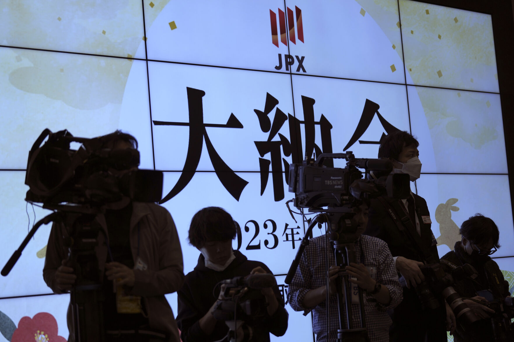 <p>Media wait for the ceremony to mark the last trading day of the year at the Tokyo Stock Exchange in Tokyo, Japan, Friday, Dec. 29, 2023. Asian shares were mixed in muted trading on Friday, Dec. 29, the last trading day of the year, with some regional markets logging solid gains in 2023 while many sagged.(AP Photo/Eugene Hoshiko)</p>   PHOTO CREDIT: Eugene Hoshiko - staff, ASSOCIATED PRESS