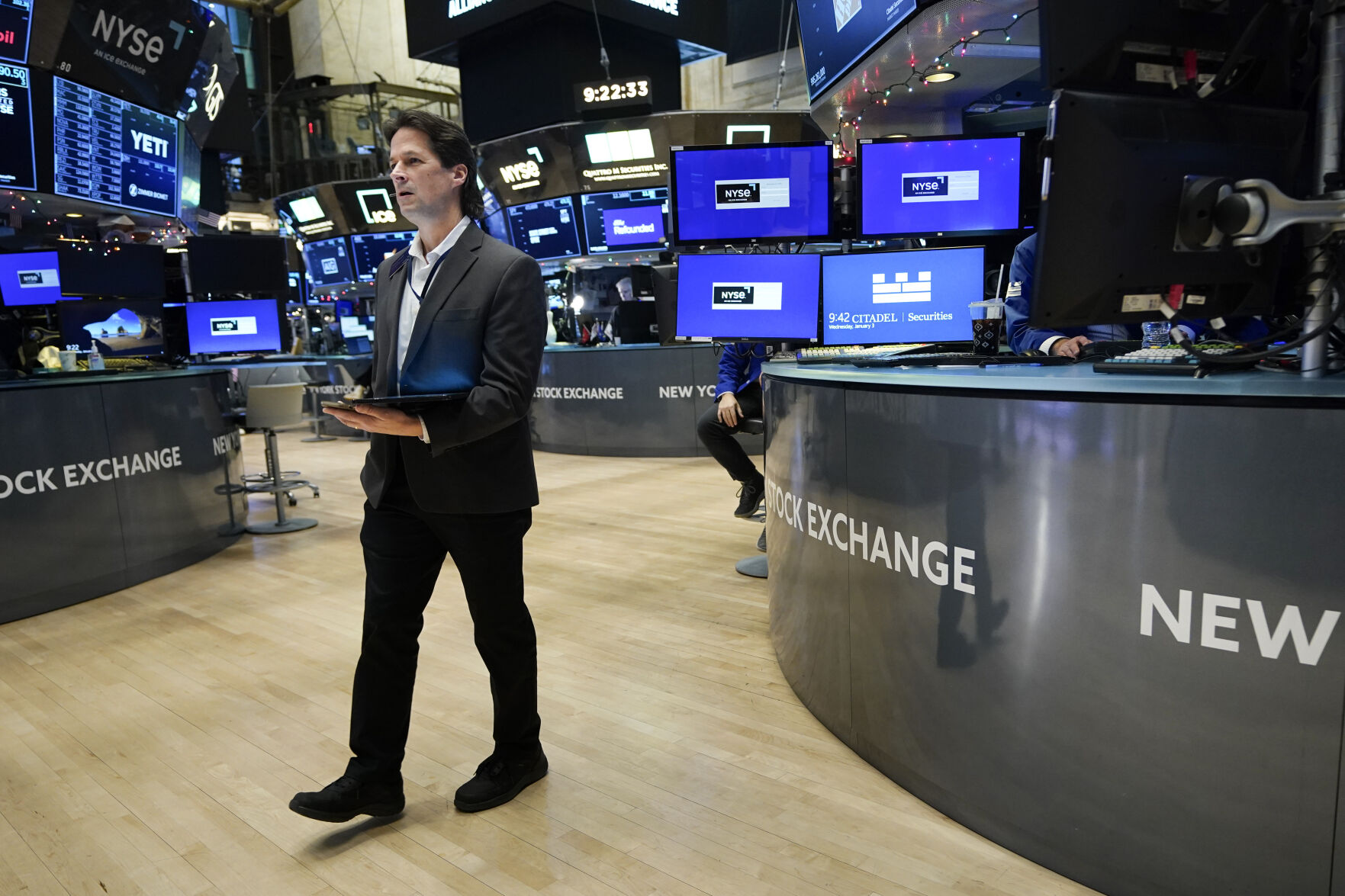 <p>Traders work on the floor at the New York Stock Exchange in New York, Wednesday, Jan. 3, 2024. (AP Photo/Seth Wenig)</p>   PHOTO CREDIT: Seth Wenig 