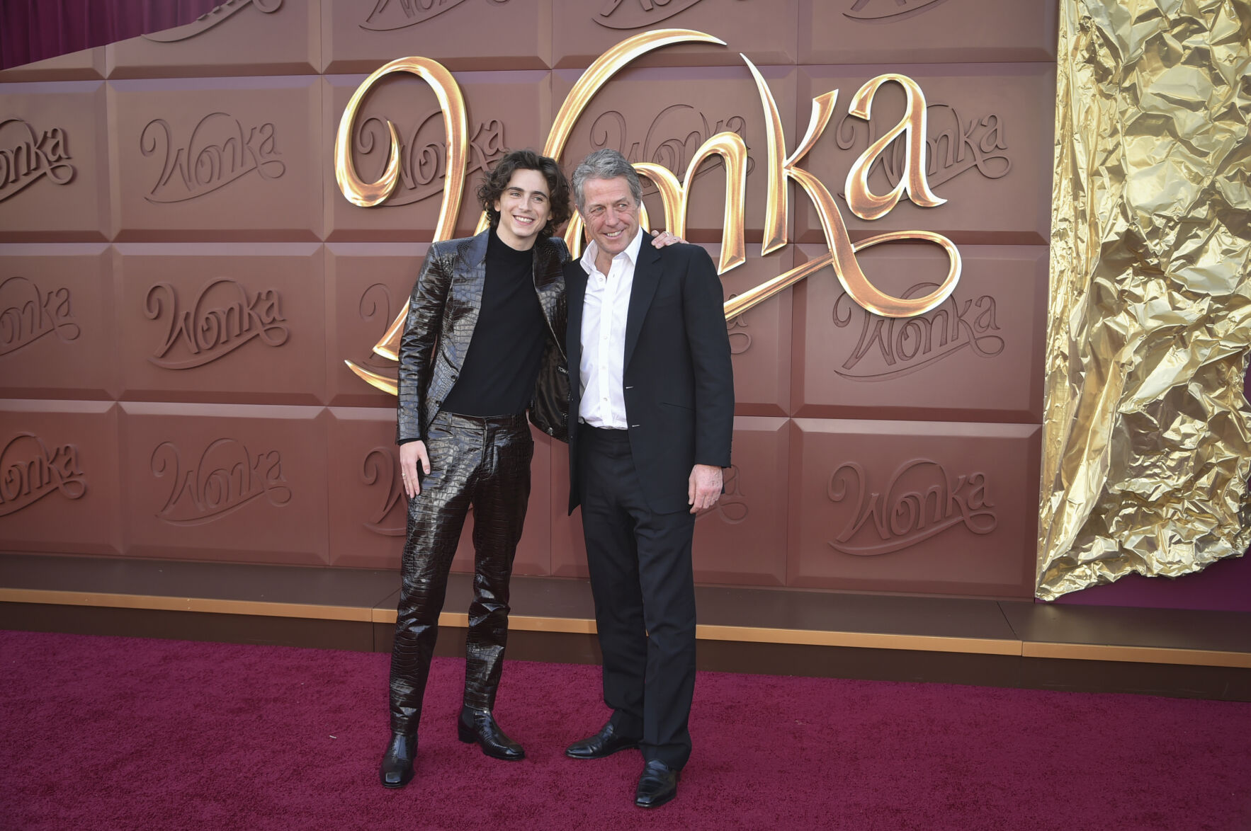 <p>Timothee Chalamet, left, and Hugh Grant arrive at the premiere of "Wonka" on Sunday, Dec. 10, 2023, at Regency Village Theatre in Westwood, Calif. (Photo by Richard Shotwell/Invision/AP)</p>   PHOTO CREDIT: Richard Shotwell 