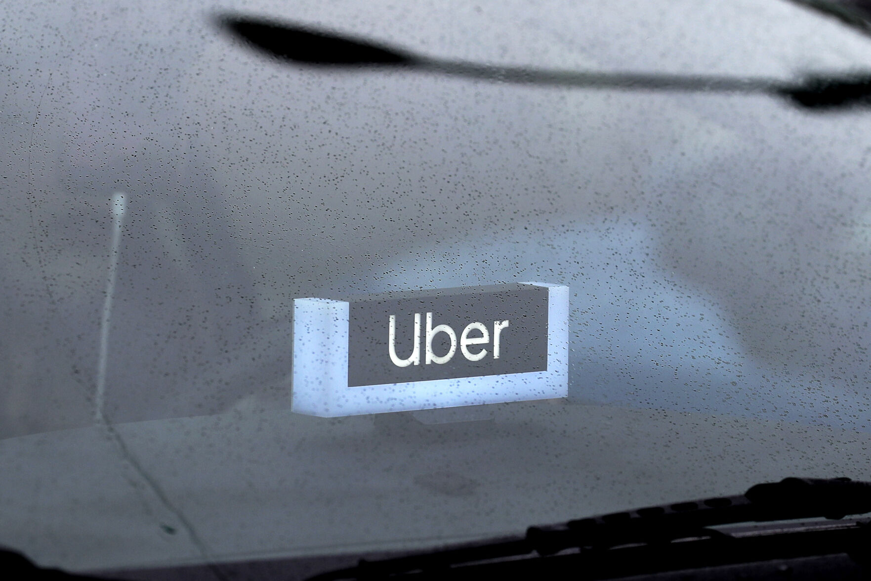 <p>FILE - An Uber sign is displayed inside a car, May 15, 2020, in Chicago. The Biden administration will enact a new labor rule Tuesday, Jan. 9, 2024, that aims to prevent the misclassification of workers as “independent contractors,” a step that could bolster both legal protections and compensation for many in the U.S. workforce. (AP Photo/Nam Y. Huh, File)</p>   PHOTO CREDIT: Nam Y. Huh