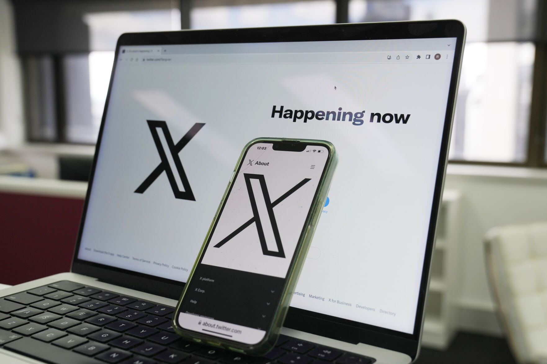 <p>FILE - The opening page of X is displayed on a computer and phone in Sydney, on Oct. 16, 2023. (AP Photo/Rick Rycroft, File)</p>   PHOTO CREDIT: Rick Rycroft 