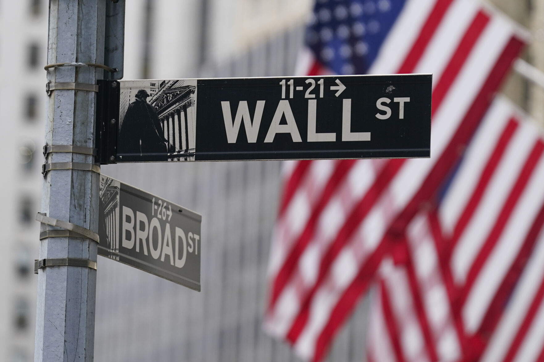 <p>FILE - A street sign is seen in front of the New York Stock Exchange in New York, Tuesday, June 14, 2022. Wall Street inched lower ahead of the opening bell Friday, Jan. 12, 2024 and oil prices jumped after the U.S. and British militaries bombed Yemen in retaliation for Houthi attacks in the Red Sea that have disrupted international trade. (AP Photo/Seth Wenig, File)</p>   PHOTO CREDIT: Seth Wenig - staff, ASSOCIATED PRESS