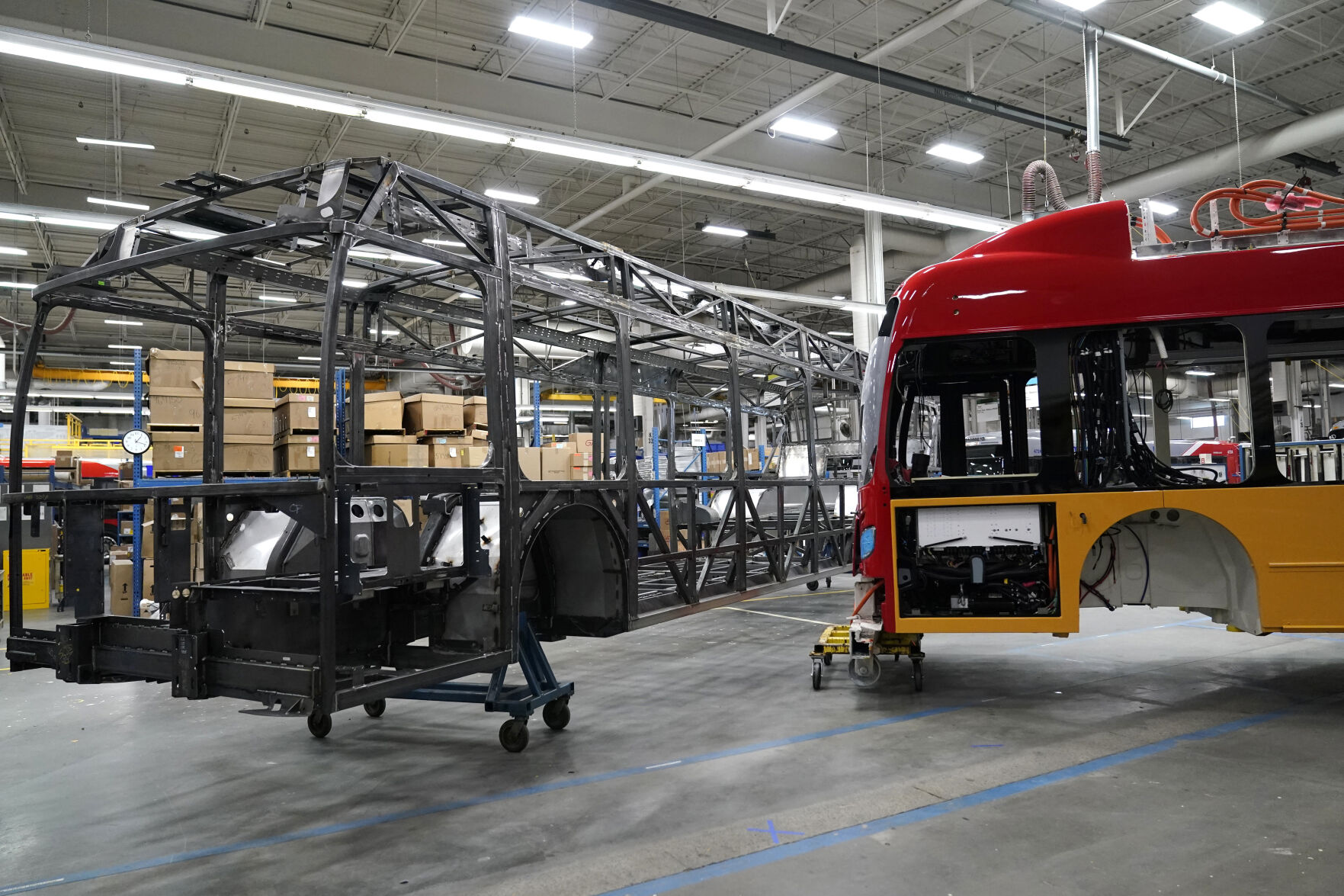 <p>File - Parts of electric busses are viewed at New Flyer, an electric vehicles manufacturing company, Feb. 9, 2023, in St. Cloud, Minn. On Friday, the Labor Department releases producer prices data for December. (AP Photo/Abbie Parr)</p>   PHOTO CREDIT: Abbie Parr - staff, ASSOCIATED PRESS