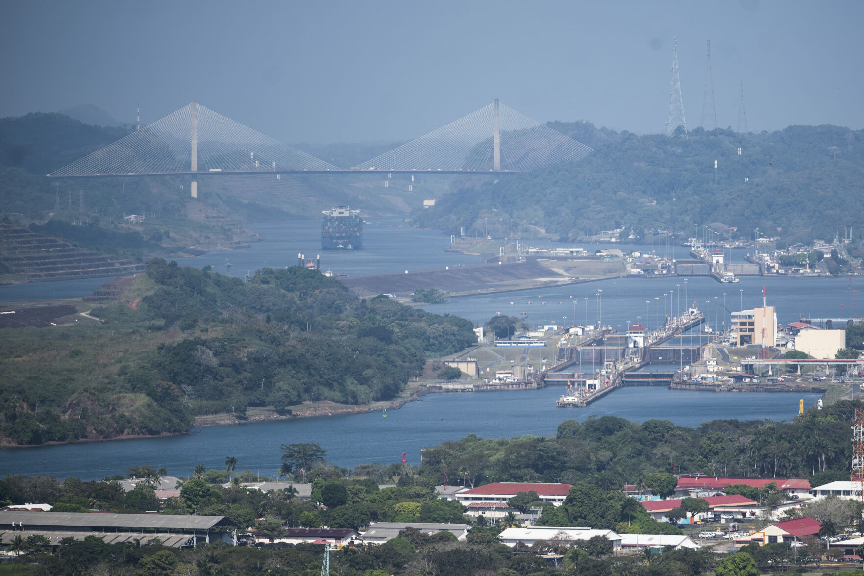 <p>A cargo ship waits near the Centennial Bridge for transit through the Panama Canal locks, in Panama City, Wednesday, Jan. 17, 2024. A severe drought that began last year has forced authorities to slash ship crossings by 36% in the Panama Canal, one of the world’s most important trade routes. (AP Photo/Agustin Herrera)</p>   PHOTO CREDIT: Agustin Herrera 