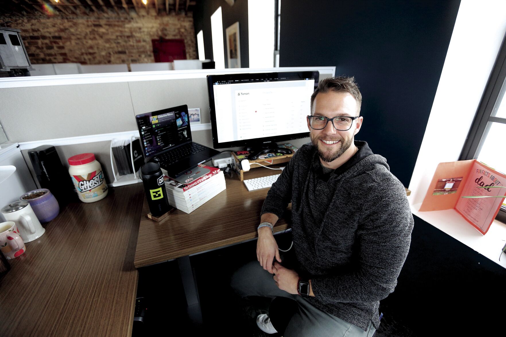 Eric Peters, of Dubuque, is a senior product designer for Tenon, a marketing solutions firm. He works remotely from the Innovation Lab’s co-working space.    PHOTO CREDIT: Dave Kettering