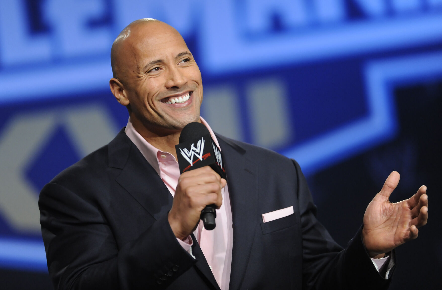 <p>FILE - Actor and former WWE Superstar Dwayne "The Rock" Johnson participates in a Wrestlemania XXVII press conference at the Hard Rock Cafe in Times Square on Wednesday, Mar. 30, 2011 in New York. It is a name that has become almost synonymous with professional wrestling but its bearer, Dwayne Johnson, has never legally owned “The Rock.” That will change under a new agreement with the WWE under whichJohnson will also join the board of TKO Group, the sports and entertainment company that houses WWE and UFC.(AP Photo/Evan Agostini, file)</p>   PHOTO CREDIT: Evan Agostini 