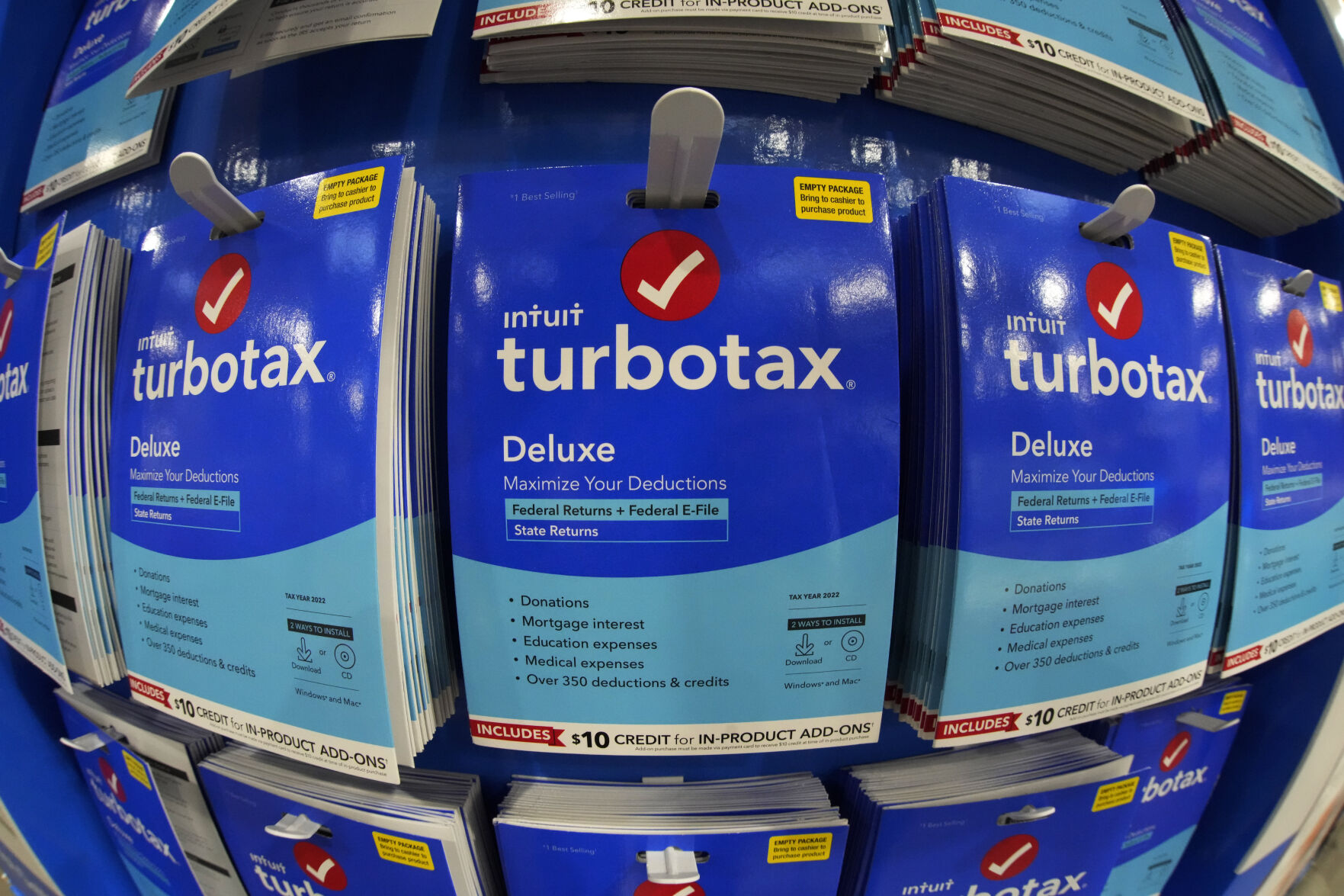 <p>FILE - This is a display of TurboTax on display in a Costco Warehouse in Pittsburgh on Thursday, Jan. 26, 2023. U.S. regulators have barred TurboTax maker Intuit Inc. from advertising its services as “free” unless they are free for all customers, or if eligibility is clearly disclosed. In an opinion and final order, the Federal Trade Commission ruled that Intuit engaged in deceptive practices by running ads claiming consumers could file their taxes for free using TurboTax — when in fact many taxpayers did not qualify for such free offerings. (AP Photo/Gene J. Puskar, File)</p>   PHOTO CREDIT: Gene J. Puskar 