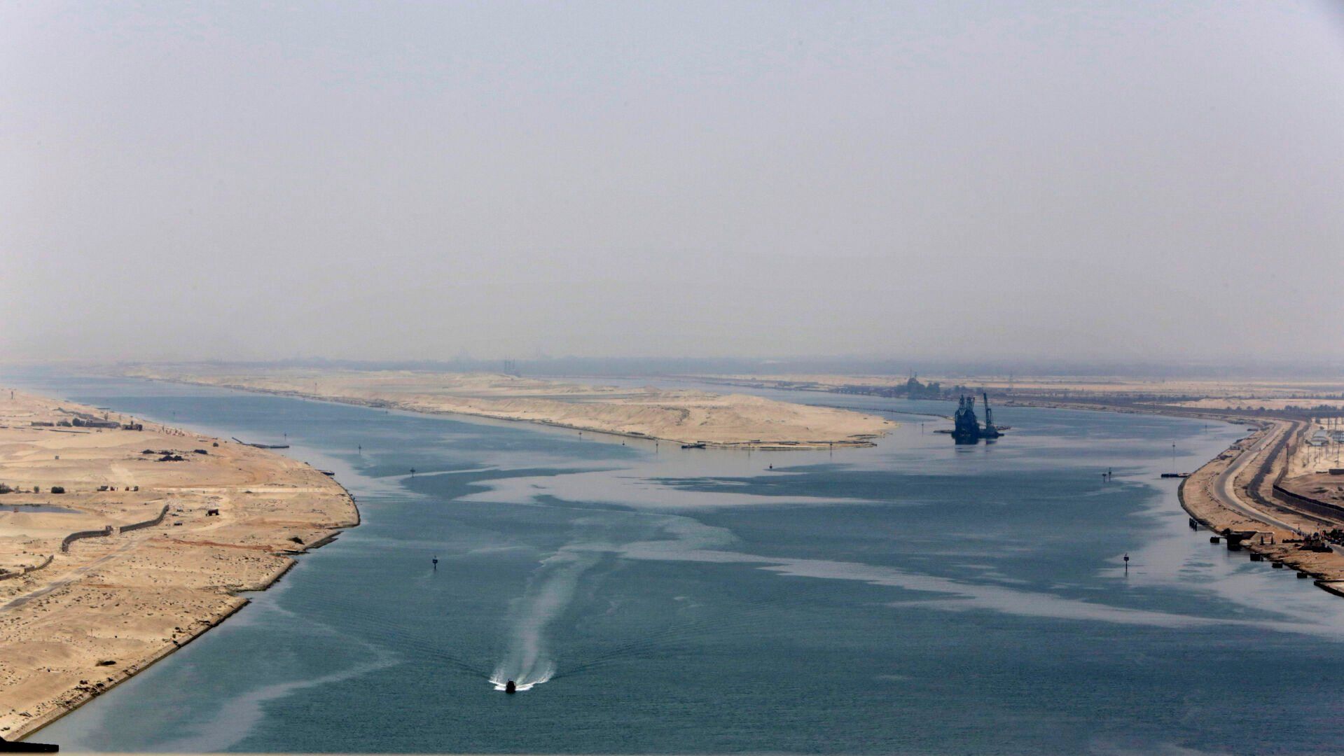 <p>FILE - An army zodiac secures the entrance of the new section of the Suez Canal in Ismailia, Egypt, on Aug. 6, 2015. China, the world’s biggest exporter, says it is deeply concerned about tensions in the Red Sea that have upended global trade by forcing many shippers to avoid the Suez Canal. (AP Photo/Amr Nabil, File)</p>   PHOTO CREDIT: Amr Nabil 