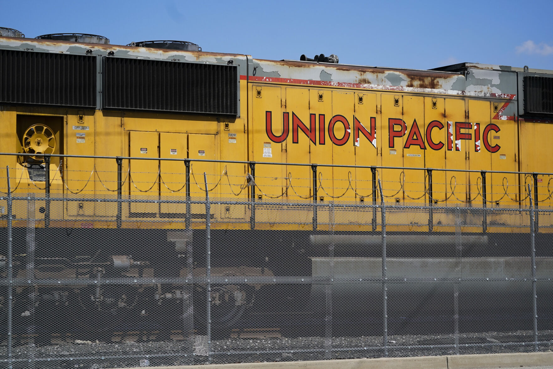 <p>FILE - A Union Pacific train engine sits in a rail yard on Wednesday, Sept. 14, 2022, in Commerce, Calif. Union Pacific reports earnings on Thursday, April 20, 2023. Union Pacific reports their earnings on Thursday, Jan. 25, 2024. (AP Photo/Ashley Landis, File)</p>   PHOTO CREDIT: Ashley Landis 