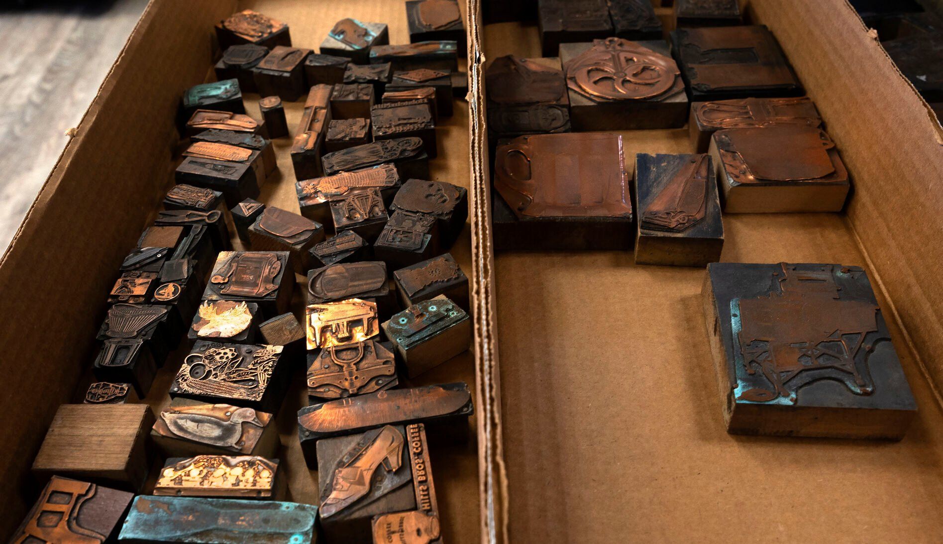 Antique printing blocks are among the items for sale at Josiah