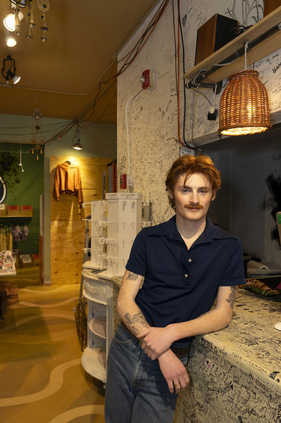 Owner Austin Scott stands inside The Neighborhood Trading Company in Galena on Tuesday, Jan. 23, 2024.    PHOTO CREDIT: Stephen Gassman