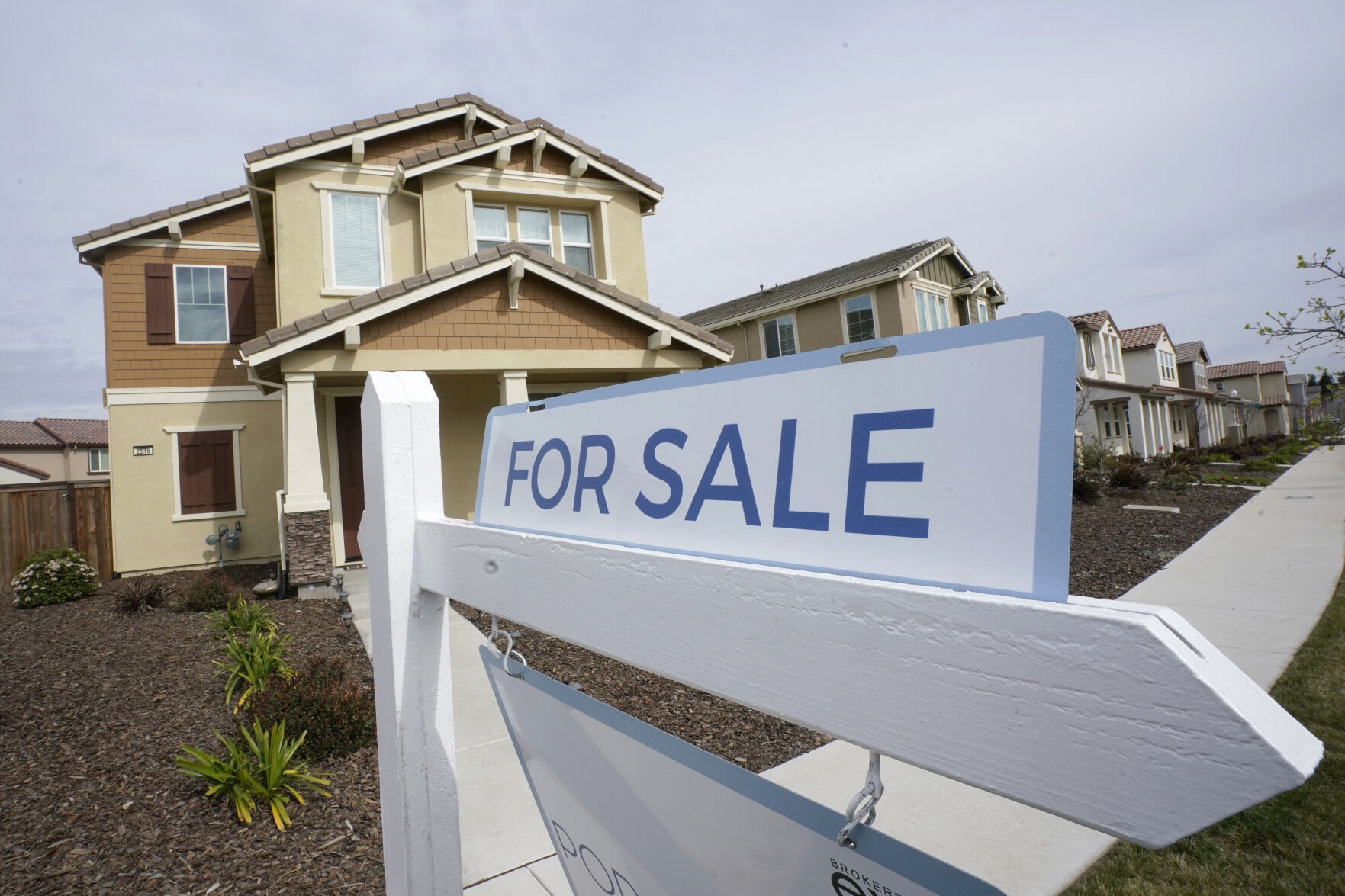 <p>FILE - A "for sale" sign is posted in front of a home in Sacramento, Calif., March 3, 2022. A closely watched housing market barometer shows U.S. home prices in November, 2023, posted their biggest annual gain in more than a year. S&P Dow Jones Indices’ CoreLogic Case-Shiller national home price index rose 5.1% over the 12 months ended in November. (AP Photo/Rich Pedroncelli, File)</p>   PHOTO CREDIT: Rich Pedroncelli 
