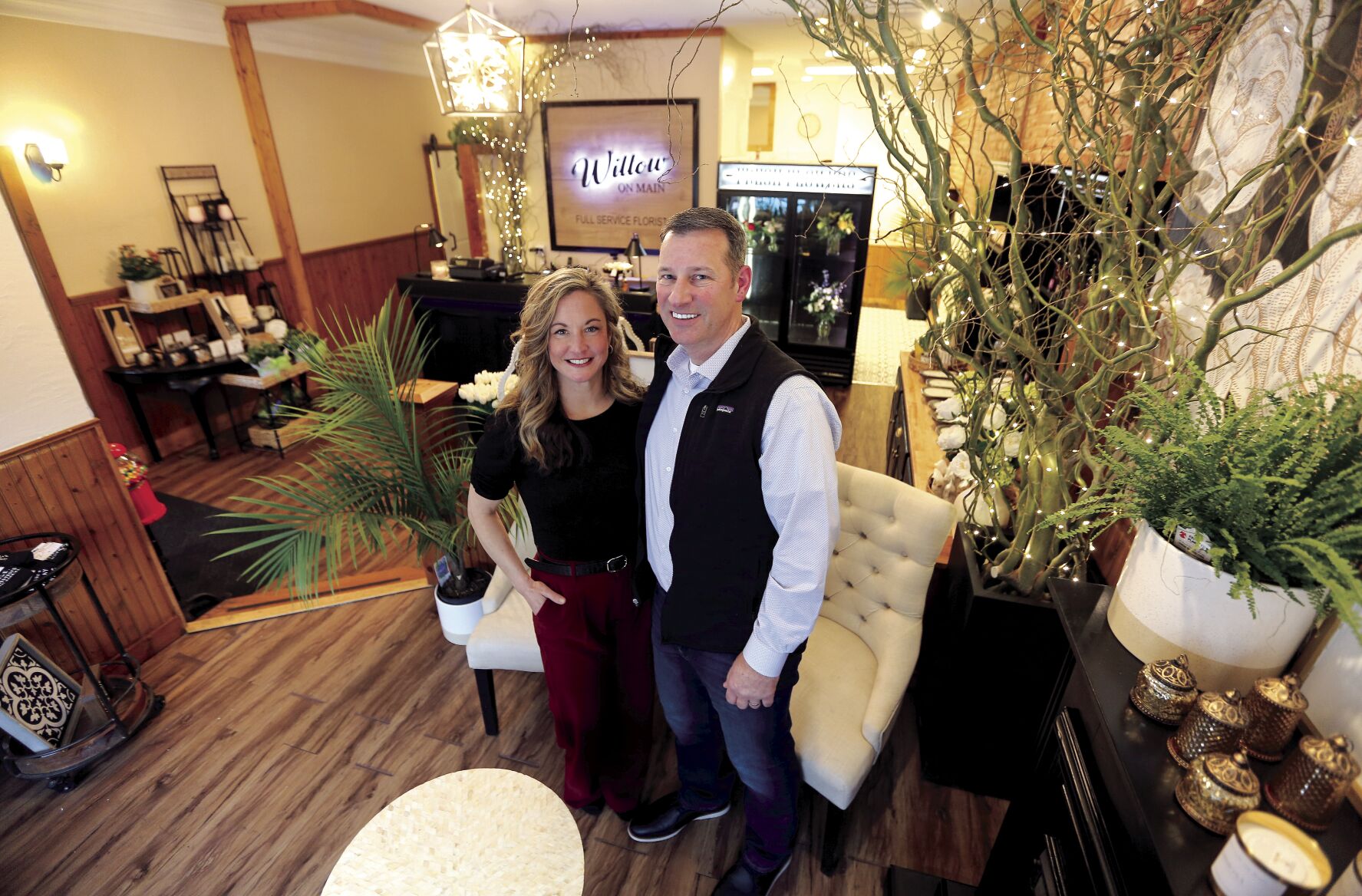 Christina and Bill Taylor, owners of Willow on Main, stand inside their shop in Galena, Ill., on Friday.    PHOTO CREDIT: Dave Kettering
