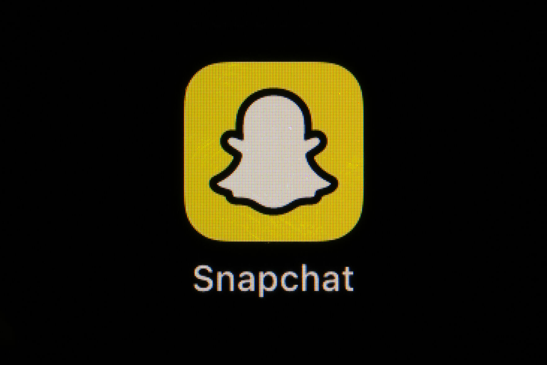 <p>The icon for instant messaging app Snapchat is seen on a smartphone, Feb. 28, 2023, in Marple Township, Pa. The owner of Snapchat is cutting approximately 10% of its worldwide workforce, or about 528 employees, just the latest tech company to announce layoffs. Snap Inc. said in a regulatory filing that it currently estimates $55 million to $75 million in charges, mostly for severance and related costs. (AP Photo/Matt Slocum)</p>   PHOTO CREDIT: Matt Slocum 
