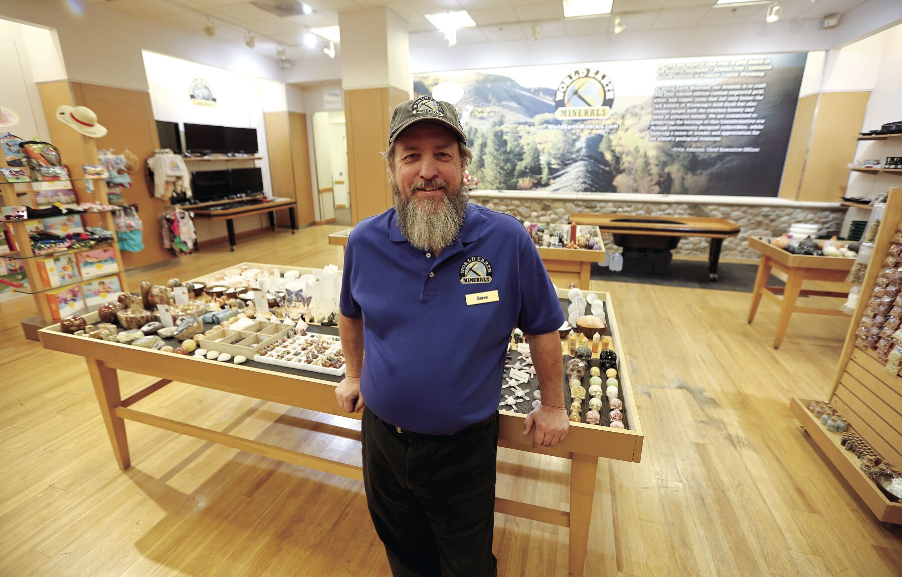 Steve Mueller is the general manager of World Earth Minerals and its attached storefront, This & That, which are now open at Kennedy Mall in Dubuque.    PHOTO CREDIT: Dave Kettering