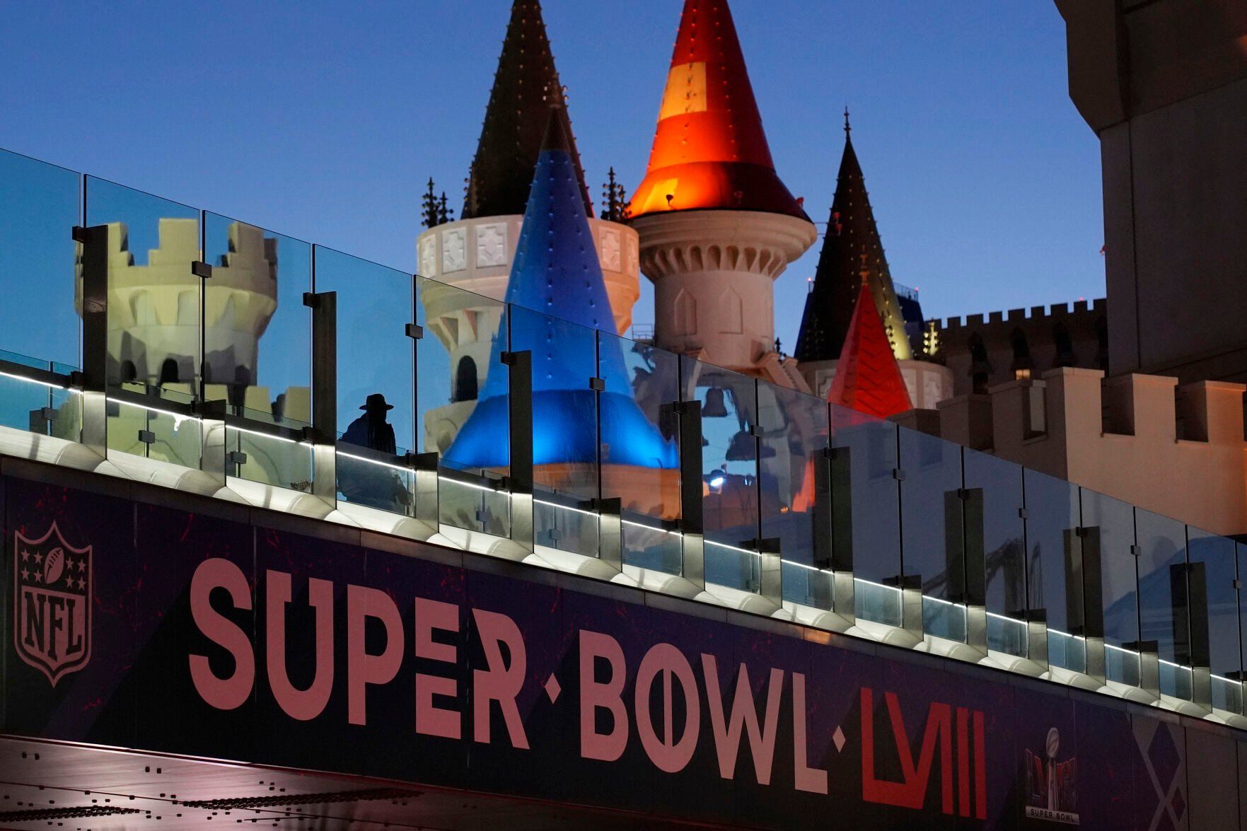 <p>A sign for Super Bowl 58 adorns a pedestrian walkway across the Las Vegas Strip ahead of the Super Bowl, Tuesday, Jan. 30, 2024, in Las Vegas. Las Vegas is scheduled to host the Super Bowl 58 on Sunday, Feb. 11, 2024. (AP Photo/John Locher)</p>   PHOTO CREDIT: John Locher 