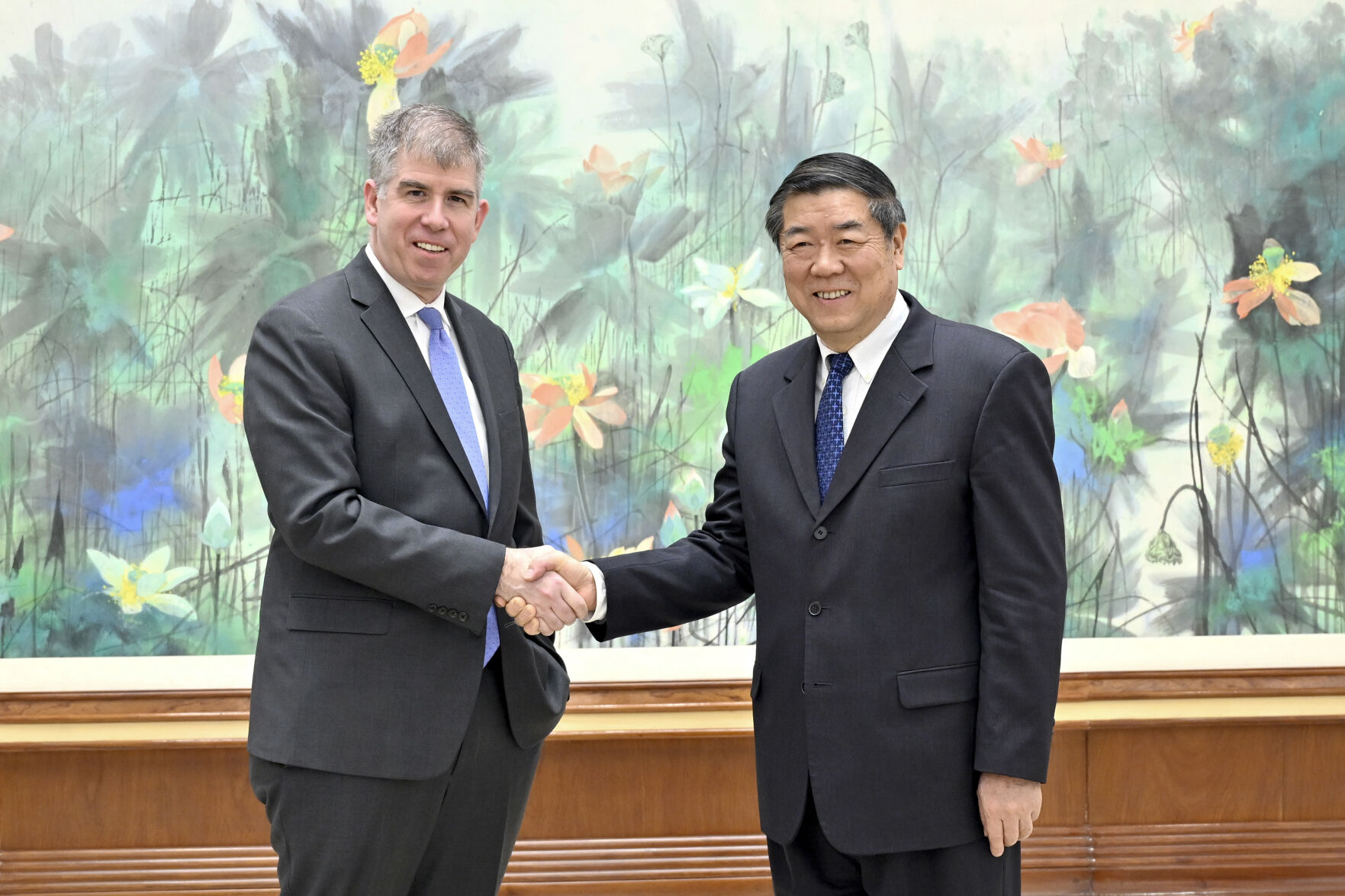 <p>CORRECTS TO DELETE AN EXTRANEOUS PHRASE OF "A DELEGATION LED BY" - In this photo released by Xinhua News Agency, Chinese Vice Premier He Lifeng, right, shakes hands with Jay Shambaugh, the Under Secretary of U.S. Department of Treasury prior to their 3rd China-US Economic Working Group Meeting in Beijing, Tuesday, Feb. 6, 2024. (Yin Bogu/Xinhua via AP)</p>   PHOTO CREDIT: Yin Bogu 