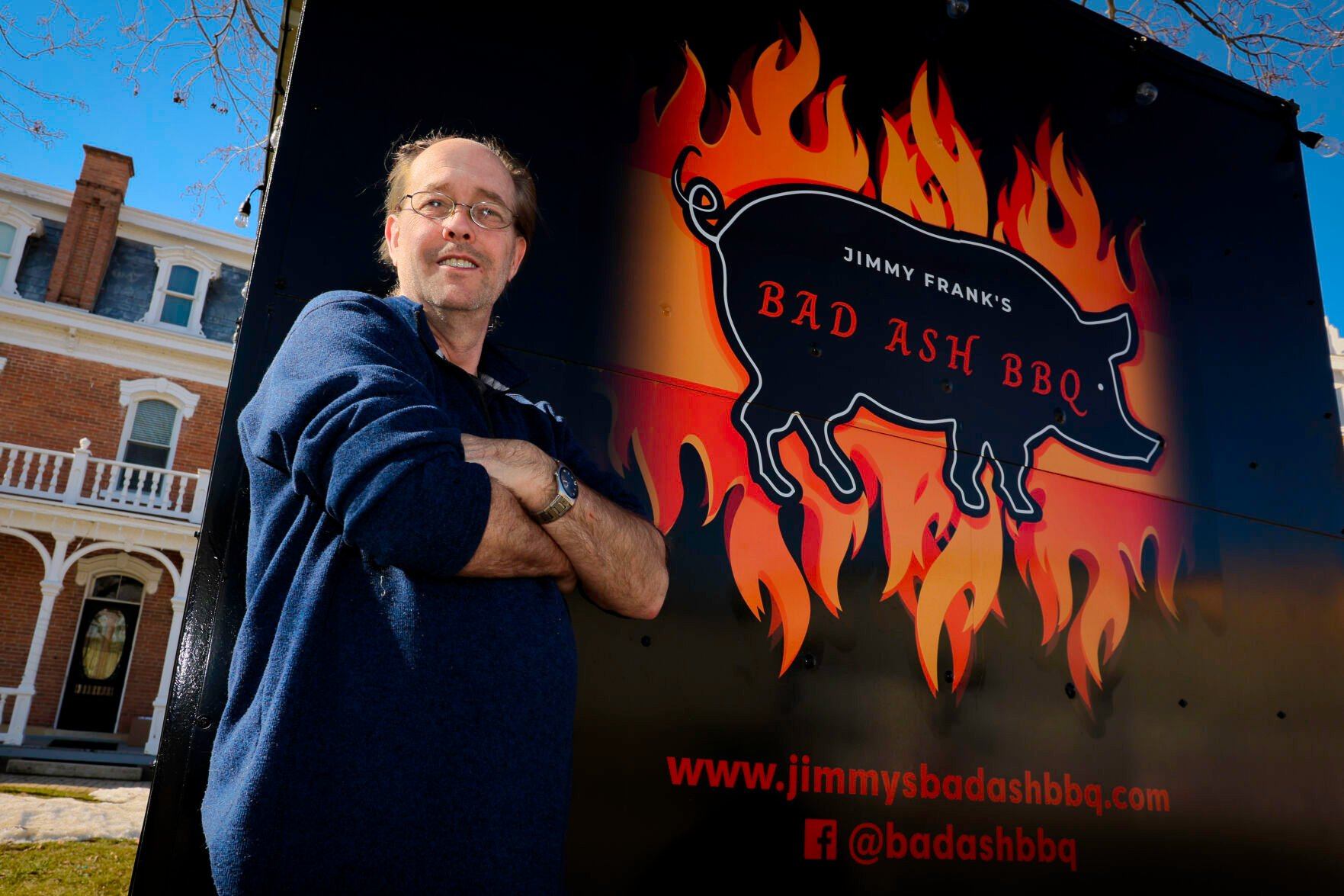 James Frank, owner of Bad Ash BBQ in Bellevue, stands in front of his mobile smoker on the day of his grand opening on Thursday, Feb. 8. 