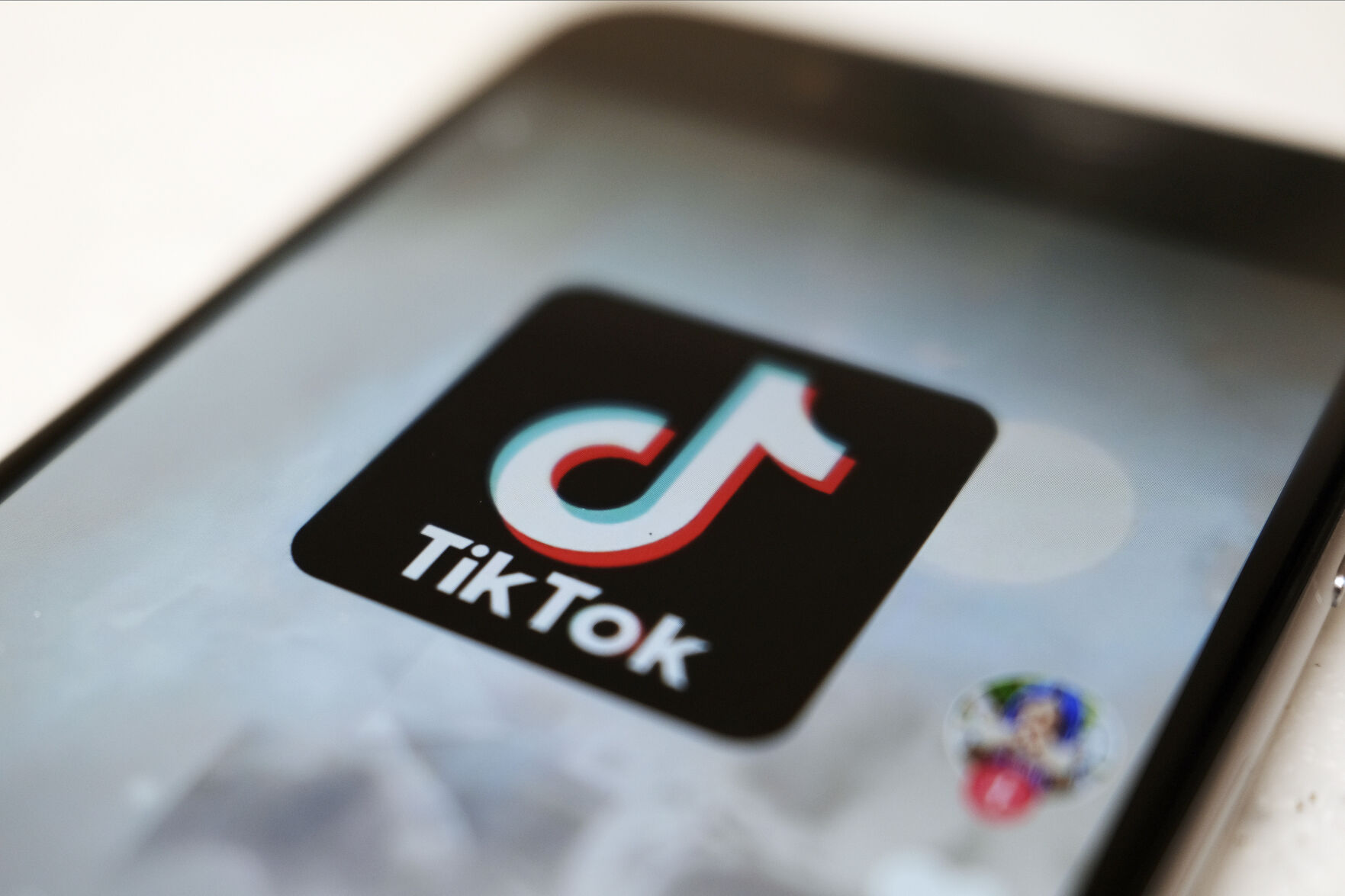 <p>FILE - The TikTok logo is displayed on a smartphone screen, Sept. 28, 2020, in Tokyo, Japan. The European Union is looking into whether TikTok has broken the bloc’s strict new digital rules for cleaning up social media and keeping internet users safe. (AP Photo/Kiichiro Sato, File)</p>   PHOTO CREDIT: Kiichiro Sato 