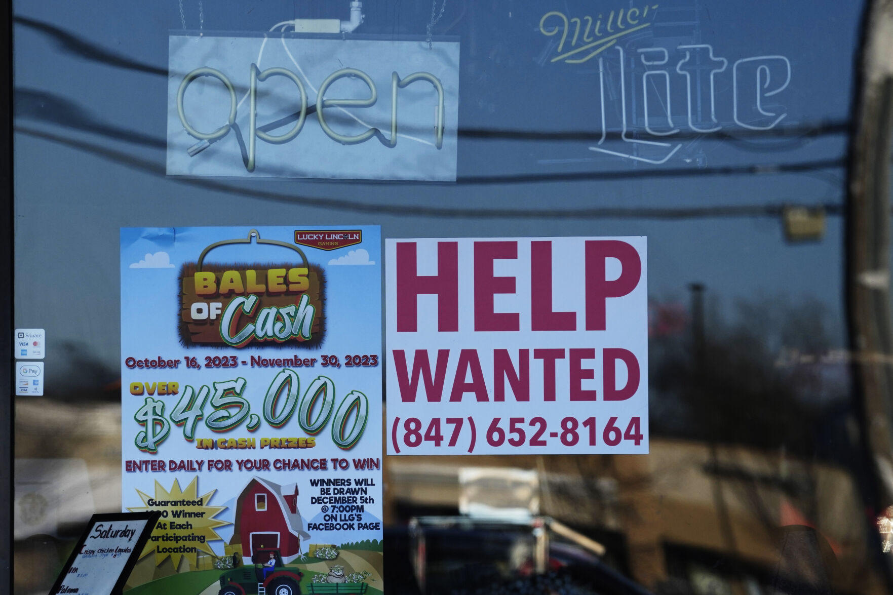 <p>A "Help Wanted" sign is displayed at a restaurant in Buffalo Grove, Ill., Thursday, Jan. 18, 2024. On Thursday, Feb. 22, 2024, the Labor Department reports on the number of people who applied for unemployment benefits last week. (AP Photo/Nam Y. Huh)</p>   PHOTO CREDIT: Nam Y. Huh 