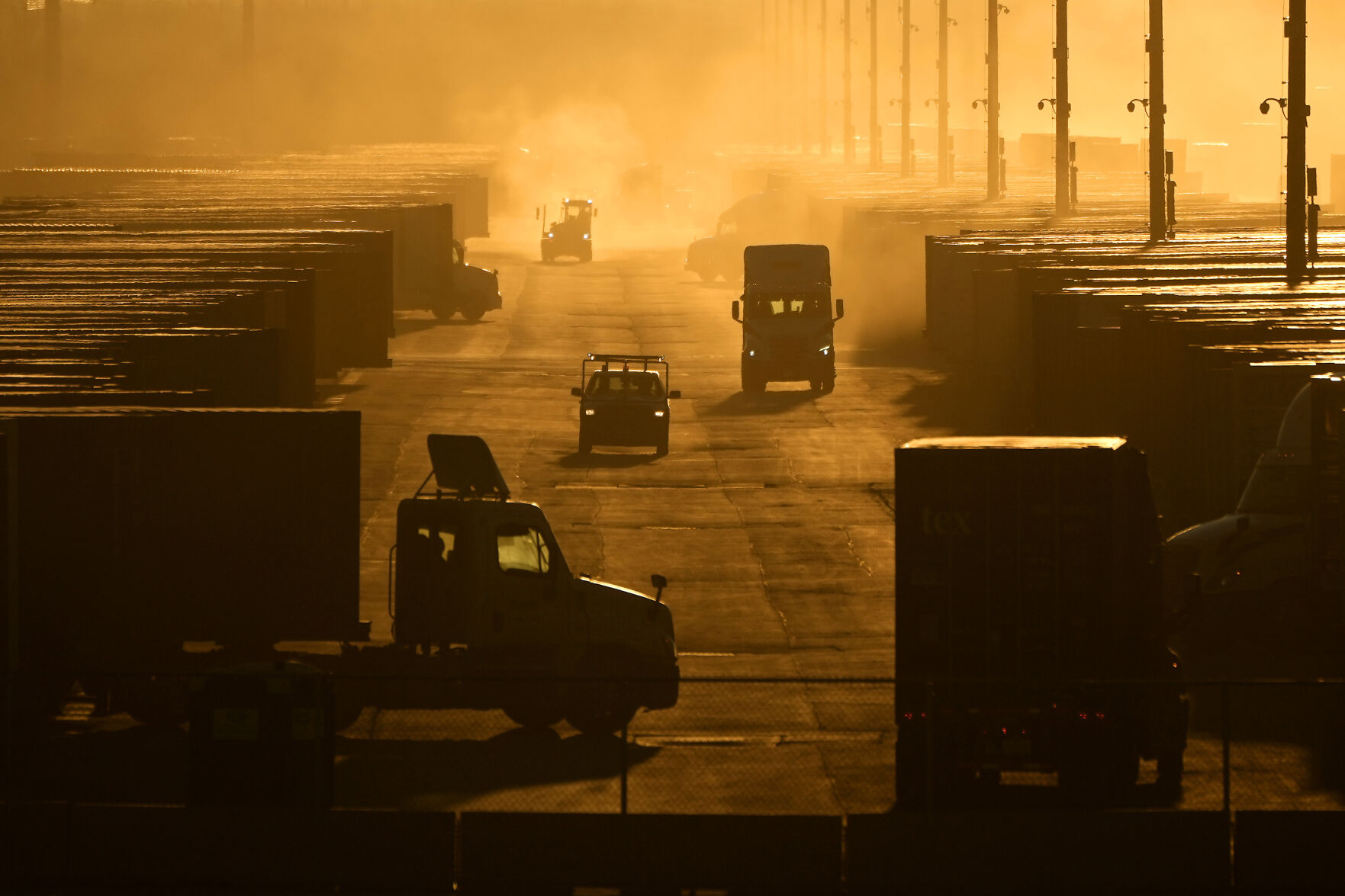 <p>Workers drive among shipping containers and trailers at a BNSF intermodal terminal, Jan. 3, 2024, in Edgerton, Kan. On Wednesday, Feb. 28, 2024, the government issues the second of three estimates of GDP growth in the United States during the October-December quarter. (AP Photo/Charlie Riedel)</p>   PHOTO CREDIT: Charlie Riedel