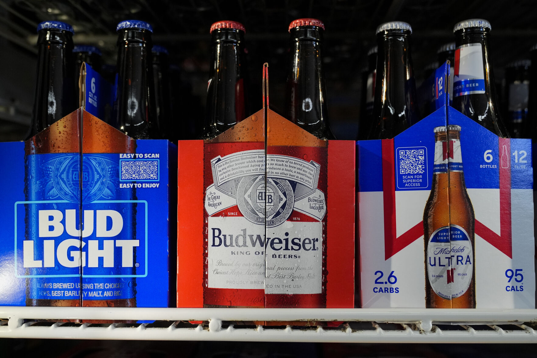 <p>Six-packs of Bud Light, Budweiser and Michelob Ultra are displayed at a liquor store, Wednesday, Feb. 28, 2024, in Fairfield, Calif. Budweiser brewer Anheuser-Busch has reached a contract agreement with the Teamsters union that avoids a strike at its U.S. plants. The union had threatened a strike at the brewer’s 12 U.S. plants if an agreement on a new five-year contract wasn’t reached by 11:59 p.m. EST Thursday. (AP Photo/Godofredo A. Vásquez)</p>   PHOTO CREDIT: Godofredo A. Vásquez