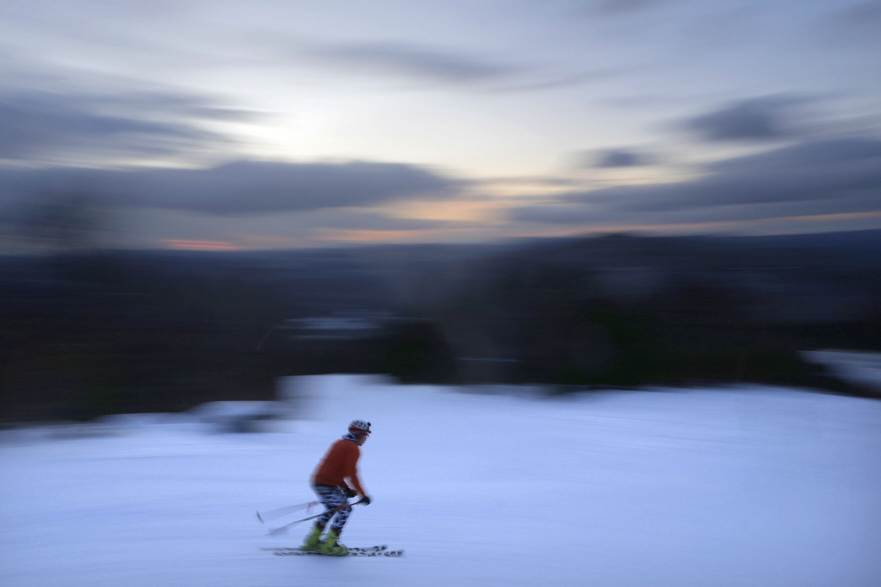 <p>FILE - A skier descends Black Mountain of Maine, Feb. 11, 2023, in Rumford, Maine. A new study says U.S. ski areas lost about $5 billion from 2000 to 2019 as a result of human-caused climate change. (AP Photo/Robert F. Bukaty, File)</p>   PHOTO CREDIT: Robert F. Bukaty