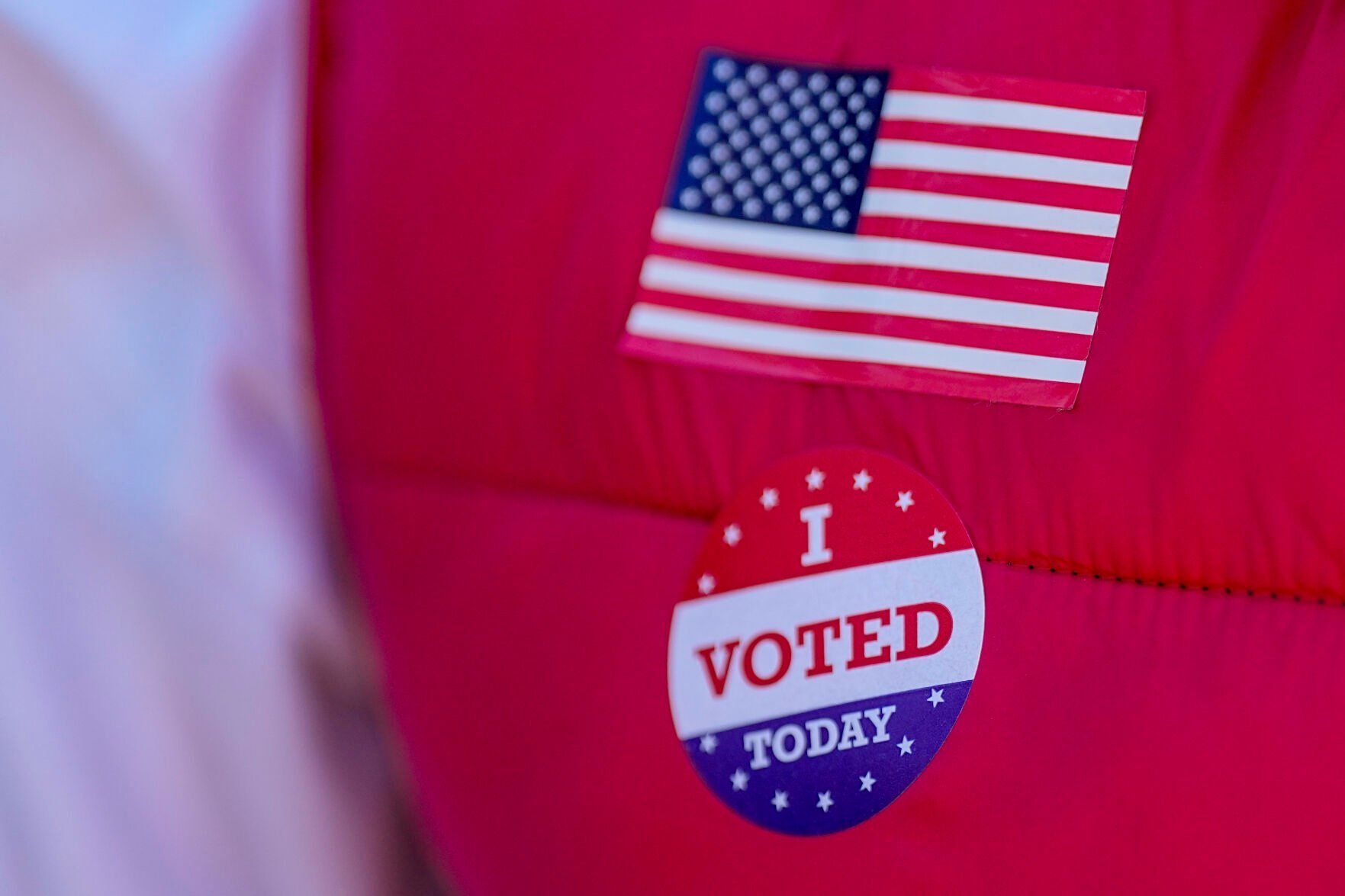 <p>Ron Worley, candidate for Gaston county commissioner, displays an I Voted Today sticker on Super Tuesday at the entrance to a polling location Tuesday, March 5, 2024, in Belmont, N.C. (AP Photo/Chris Carlson)</p>   PHOTO CREDIT: Chris Carlson