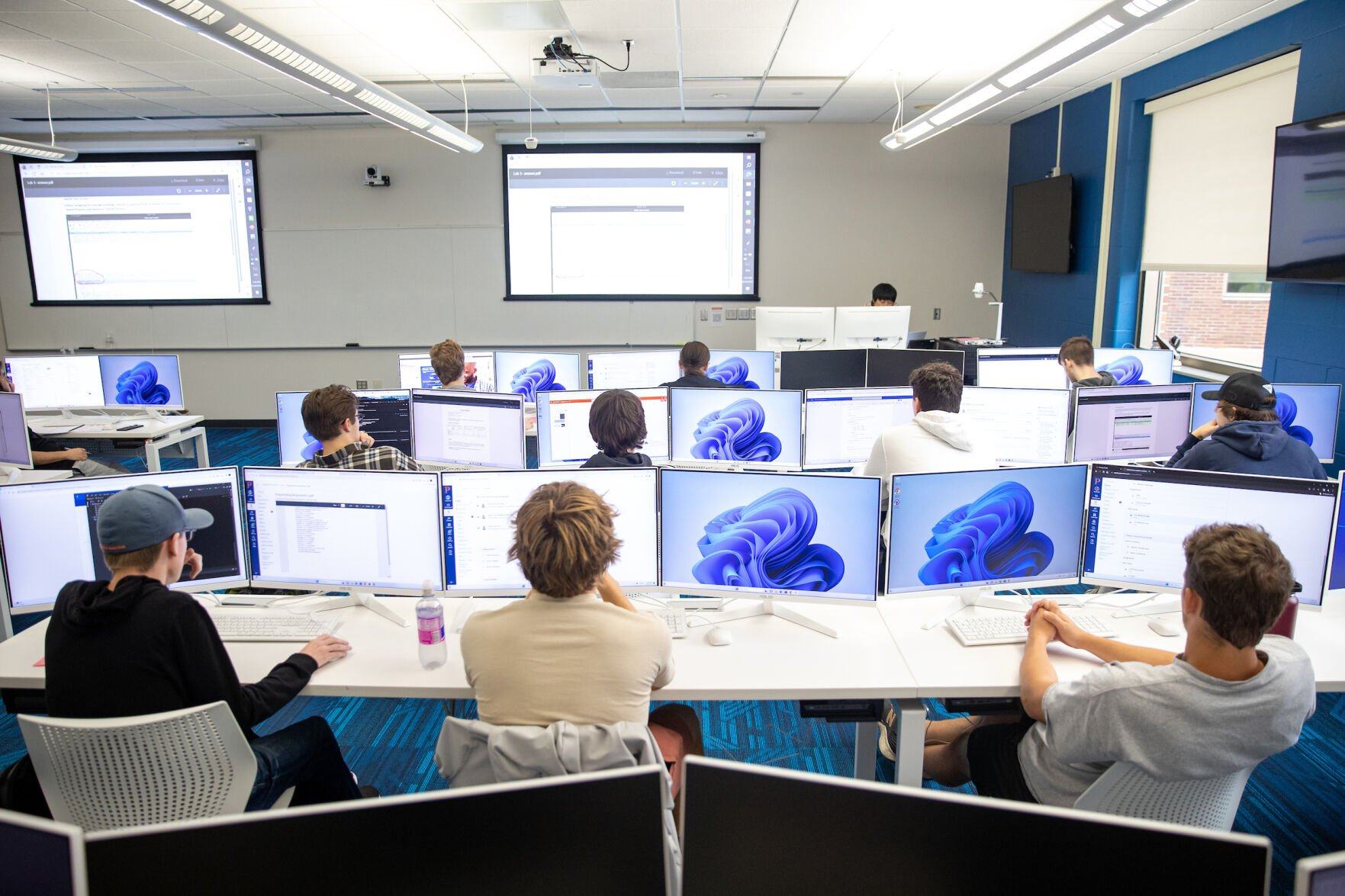 University of Wisconsin-Platteville students utilize the university’s CyberLab in Busby Hall of Engineering. The lab is used for the university’s cybersecurity program, which launched in 2020 in response to growing demand for cybersecurity professionals.    PHOTO CREDIT: Contributed