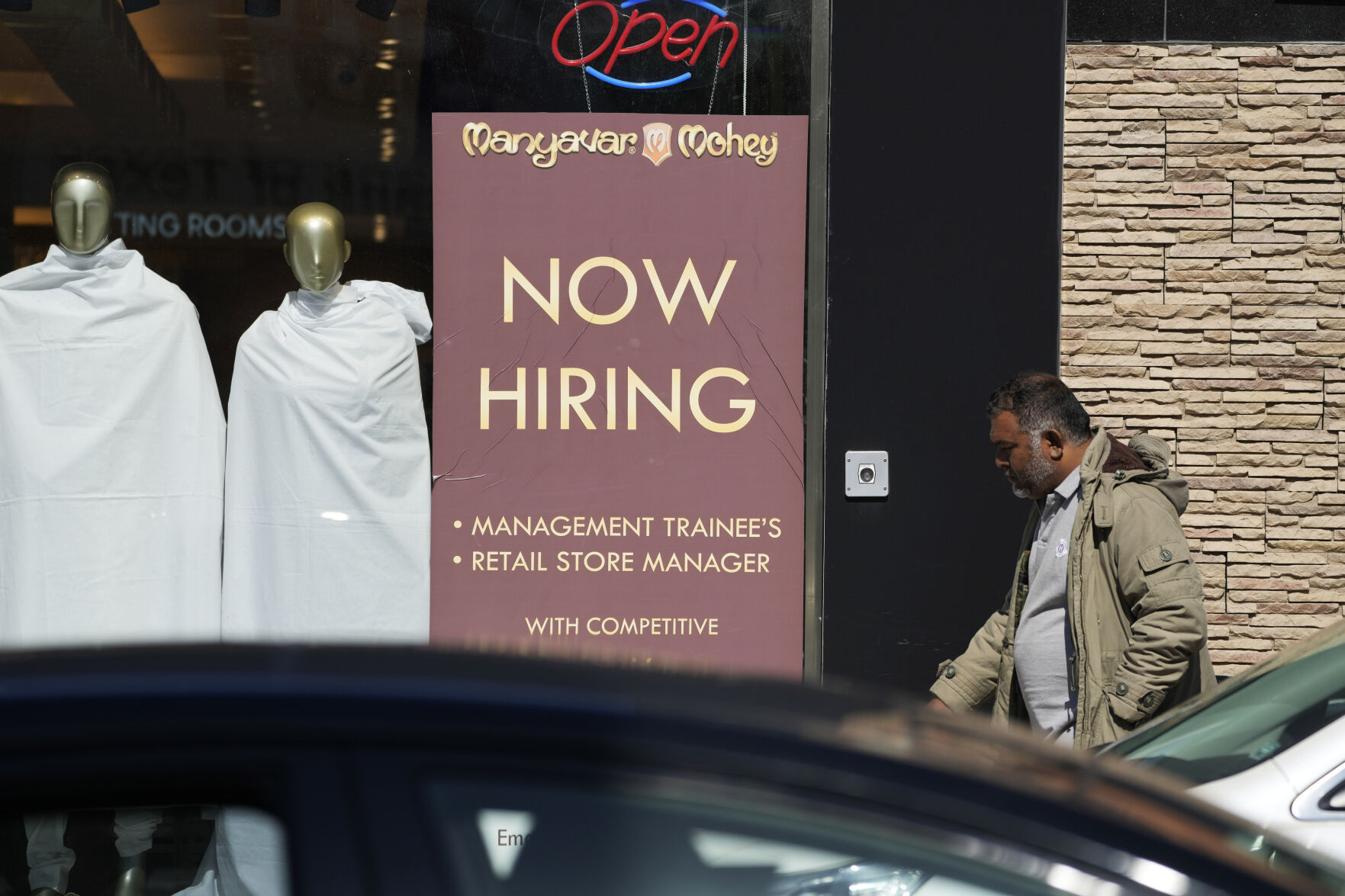 A hiring sign is displayed at a retail store in Chicago on Monday, March 11, 2024. On Thursday, March 14, 2024, the Labor Department reports on the number of people who applied for unemployment benefits last week. (AP Photo/Nam Y. Huh)    PHOTO CREDIT: Associated Press