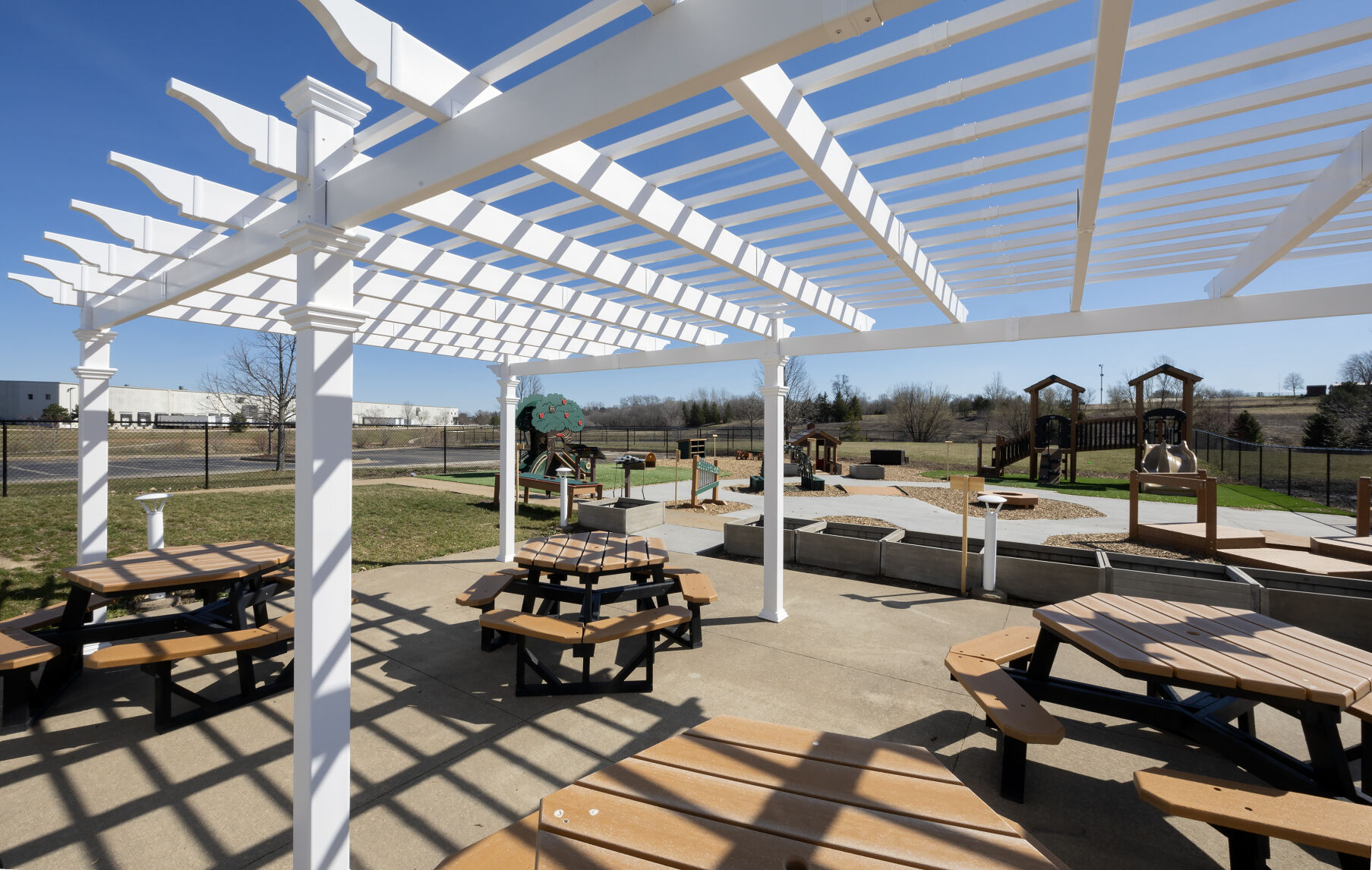 The playground and outdoor seating area at the new Dubuque Y Early Learning Center on Chavenelle Road in Dubuque on Wednesday, March 20, 2024.    PHOTO CREDIT: Gassman