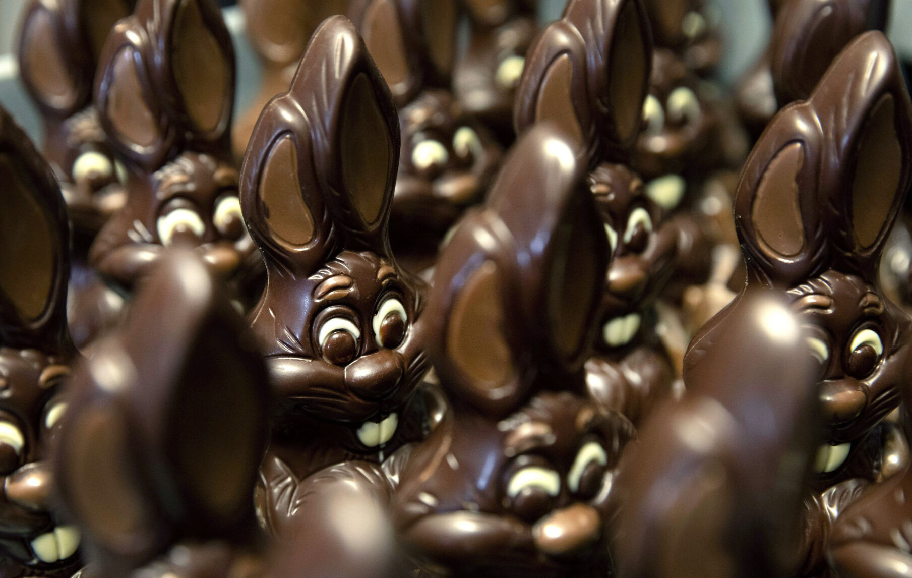 <p>FILE - Chocolate rabbits wait to be decorated at the Cocoatree chocolate shop, April 8, 2020, in Lonzee, Belgium. Sweet Easter baskets will likely come at a bitter cost this year for consumers as the price of cocoa climbs to record highs. (AP Photo/Virginia Mayo, File)</p>   PHOTO CREDIT: Virginia Mayo 