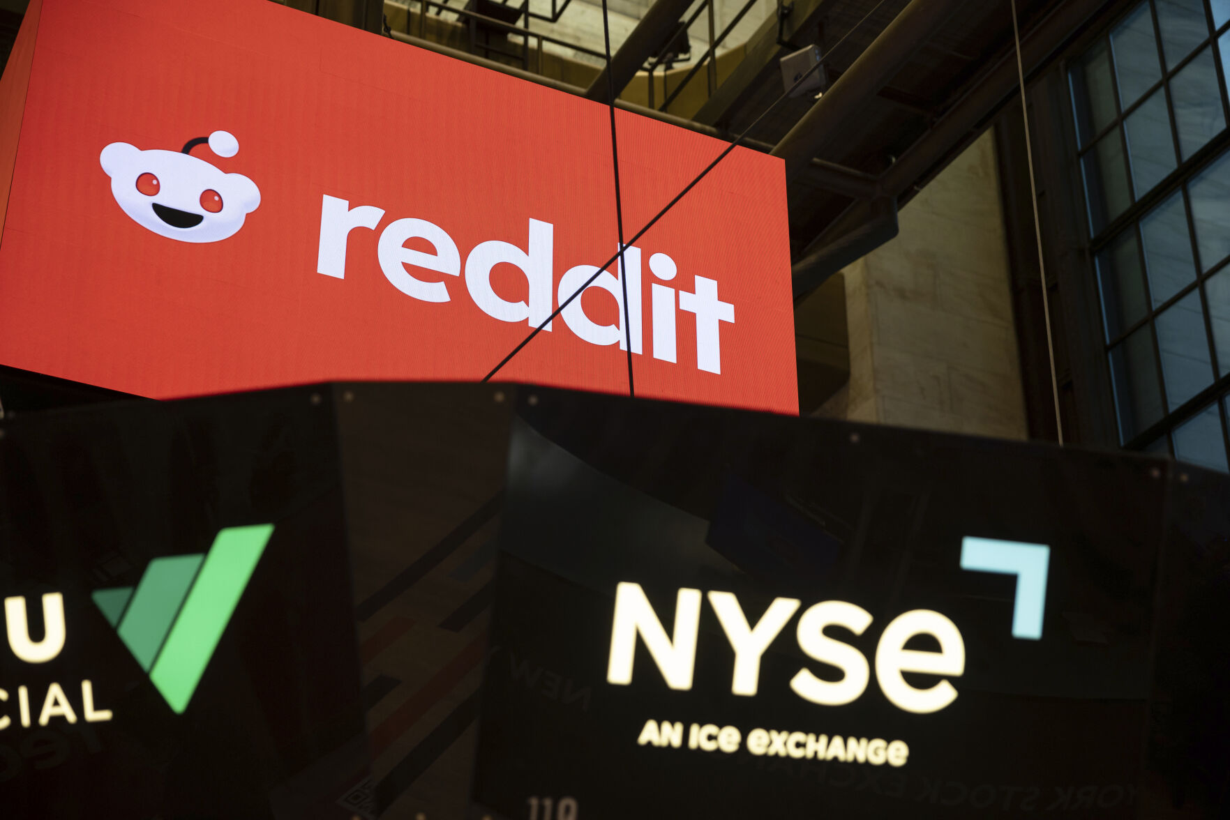 <p>Reddit Inc. signage is seen on the New York Stock Exchange trading floor, prior to Reddit IPO, Thursday, March. 21, 2024. (AP Photo/Yuki Iwamura)</p>   PHOTO CREDIT: Yuki Iwamura - freelancer, ASSOCIATED PRESS