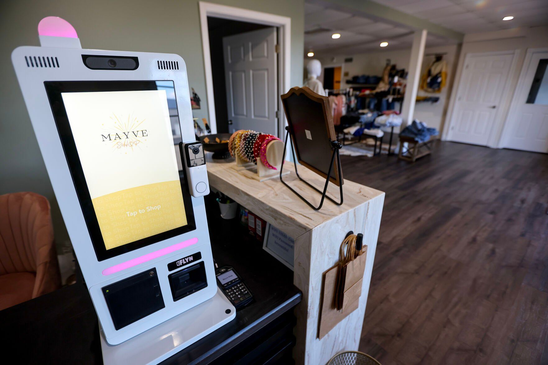 One of the added features at Mayve is this self-checkout kiosk.    PHOTO CREDIT: Dave Kettering