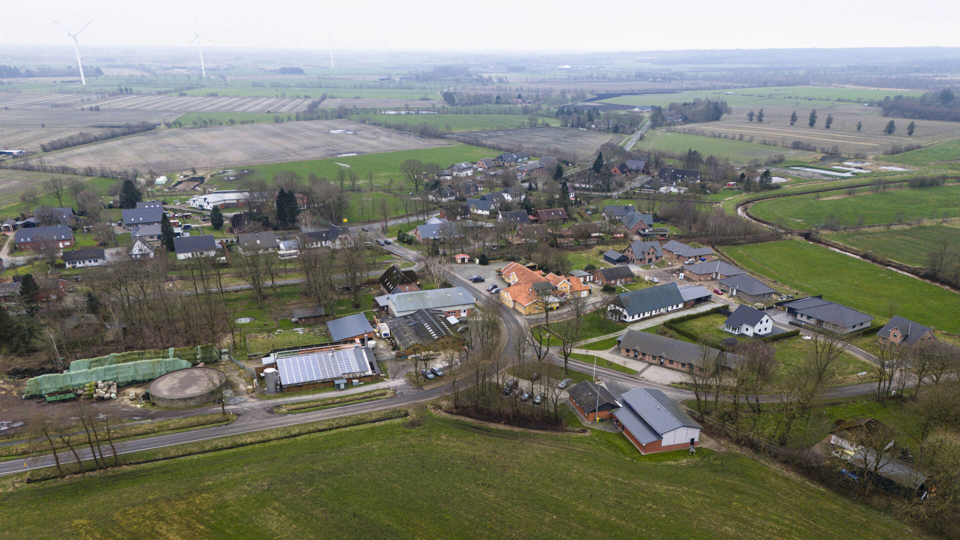 <p>The village Sprakebuell, Germany, is shown in an aerial photo taken Thursday, March 14, 2024. Sprakebuell is something of a model village for the energy transition - with an above-average number of electric cars, a community wind farm and renewable heat from biogas. All houses in the village center have been connected to the local heating network and all old oil heating systems have been removed. (AP Photo/Frank Molter)</p>   PHOTO CREDIT: Frank Molter 