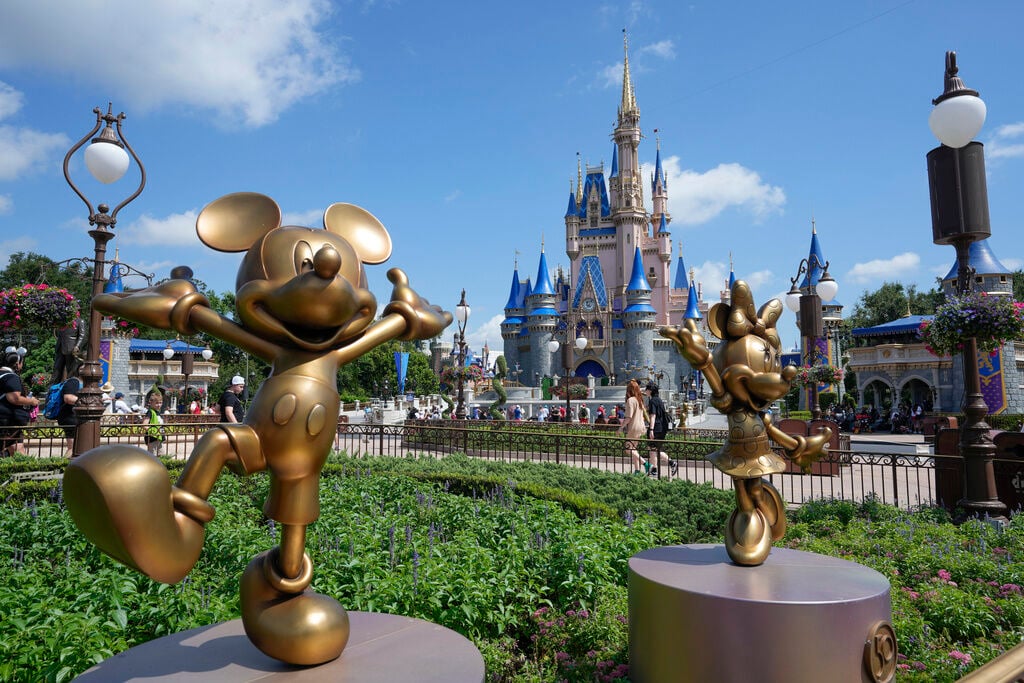 Allies of Florida Gov. Ron DeSantis and Disney reached a settlement agreement in a lawsuit over who controls Walt Disney World’s governing district.    PHOTO CREDIT: John Raoux