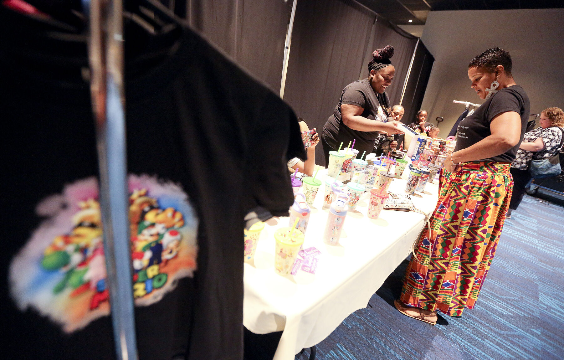 Tika Sykes (left), owner of KLS Kreation talks with fellow businesswoman Jackie Hunter during the 3rd Annual Black Business Expo held at the Q Casino in 2023.    PHOTO CREDIT: File photo