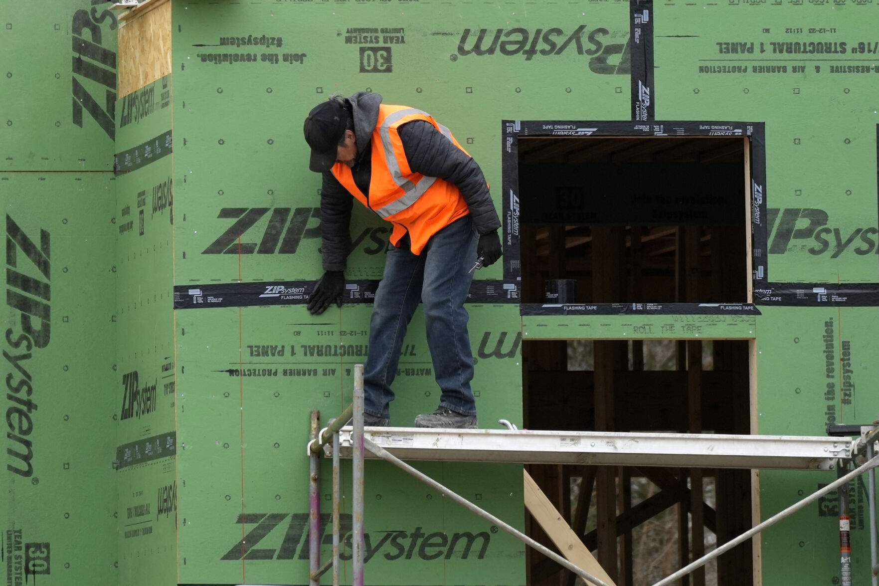 <p>A workman secures sheathing at a residential construction site in Mount Prospect, Ill., Monday, March 18, 2024. On Tuesday, April 2, 2024, the Labor Department reports on job openings and labor turnover for February. (AP Photo/Nam Y. Huh)</p>   PHOTO CREDIT: Nam Y. Huh 