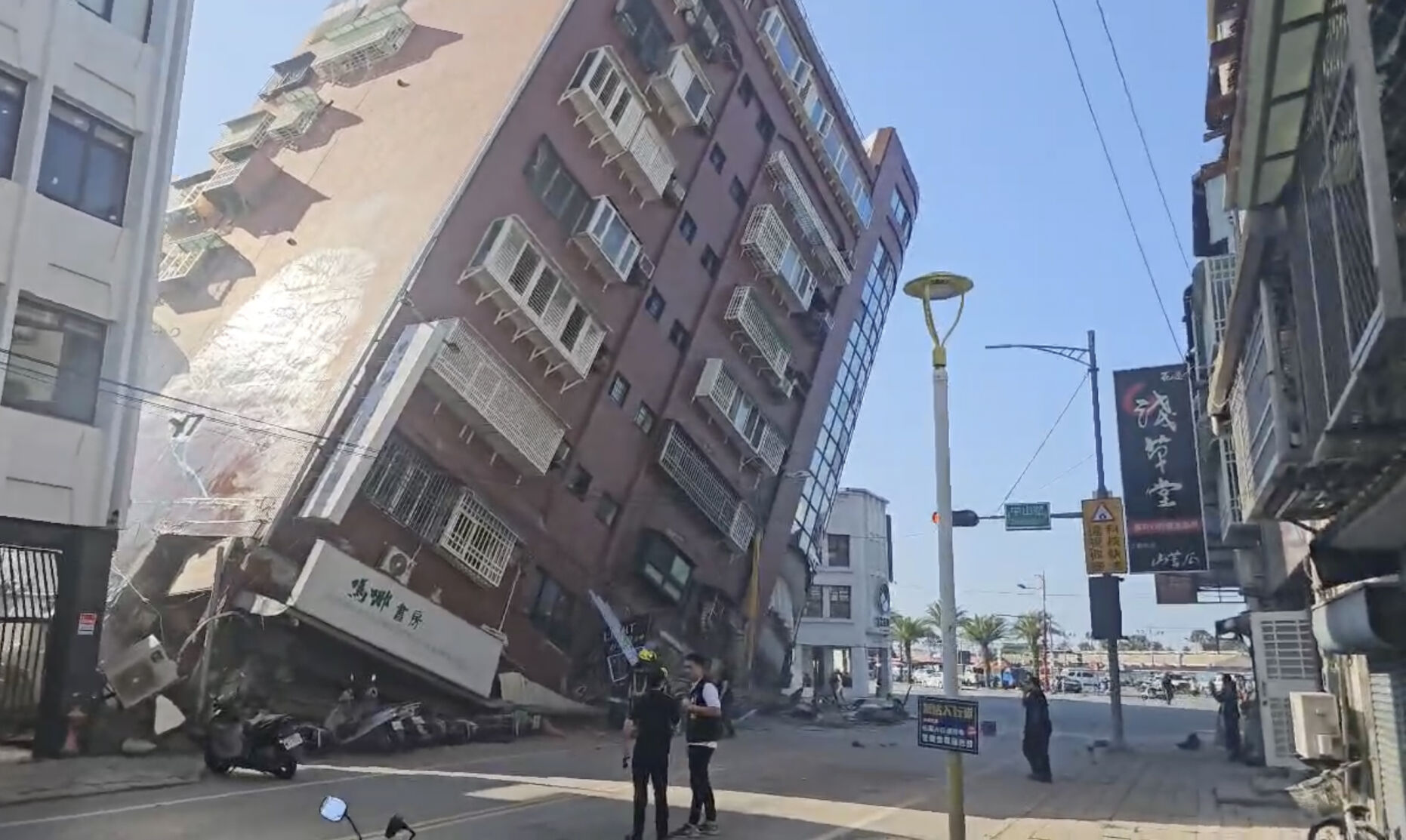 <p>In this image taken from a video footage run by TVBS, a partially collapsed building is seen in Hualien, eastern Taiwan on Wednesday, April 3, 2024. A powerful earthquake rocked the entire island of Taiwan early Wednesday, collapsing buildings in a southern city and creating a tsunami that washed ashore on southern Japanese islands. (TVBS via AP)</p>   PHOTO CREDIT: TVBS via AP