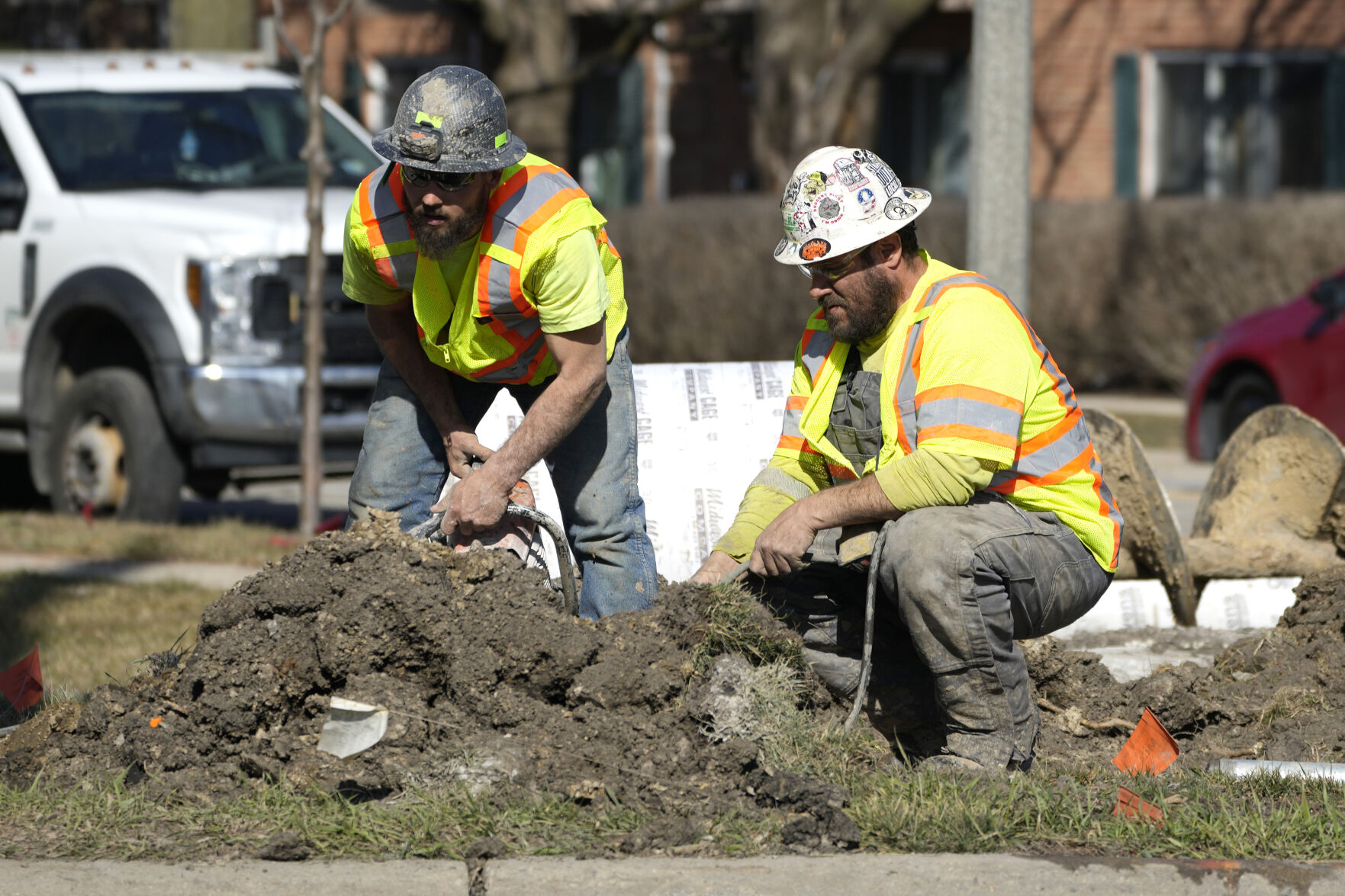 FILE - Construction workers work in Mount Prospect, Ill., Monday, Feb. 26, 2024. On Friday, April 5, 2024, the U.S. government issues its March jobs report. (AP Photo/Nam Y. Huh, File)    PHOTO CREDIT: Associated Press