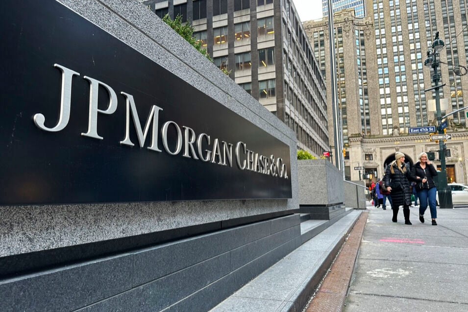 <p>FILE - Pedestrians approach JPMorgan Chase headquarters on Dec. 29, 2023, in New York. JP Morgan reports earnings on Friday, April 12, 2024. (AP Photo/Peter Morgan, File)</p>   PHOTO CREDIT: Peter Morgan - staff, ASSOCIATED PRESS