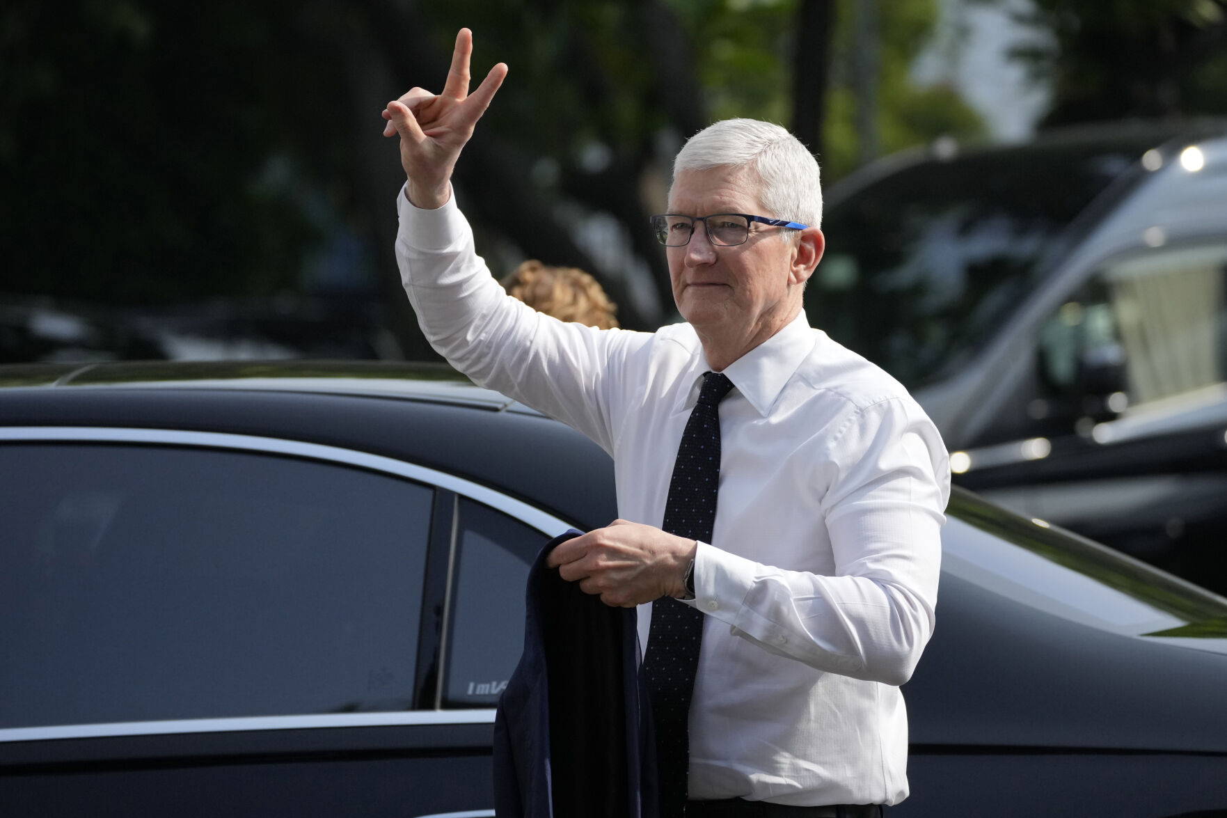 <p>Apple CEO Tim Cook gestures upon the arrival for a meeting with Indonesian President Joko Widodo at palace in Jakarta, Indonesia, Wednesday, April 17, 2024.(AP Photo/Achmad Ibrahim)</p>   PHOTO CREDIT: Achmad Ibrahim 