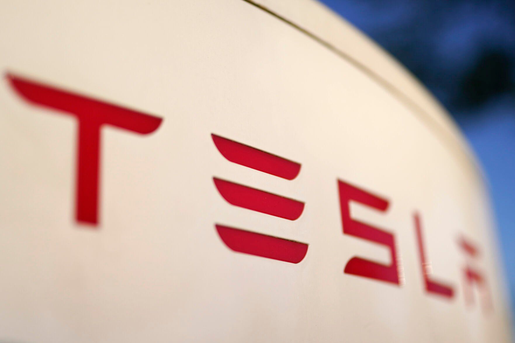 <p>FILE - The logo for the Tesla Supercharger station is seen in Buford, Ga, April 22, 2021. Faced with falling global sales and a tumbling stock price, Tesla has slashed prices again on some of its electric vehicles and its “Full Self Driving” system. Tesla releases first-quarter earnings Tuesday, April 23, 2024. (AP Photo/Chris Carlson, File)</p>   PHOTO CREDIT: Chris Carlson - staff, ASSOCIATED PRESS