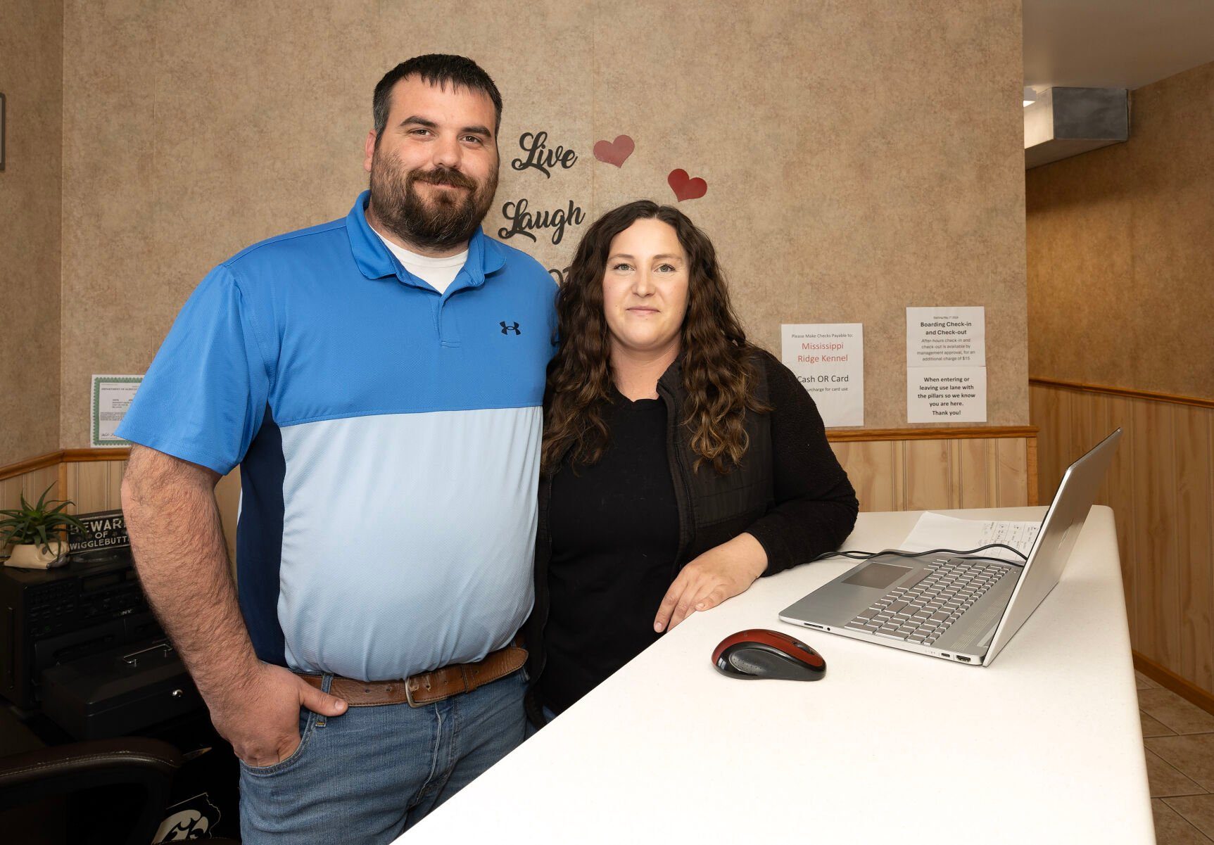 Jason and Haley Edwards stand in the lobby at Mississippi Ridge Kennel near Bellevue, Iowa.    PHOTO CREDIT: Stephen Gassman
