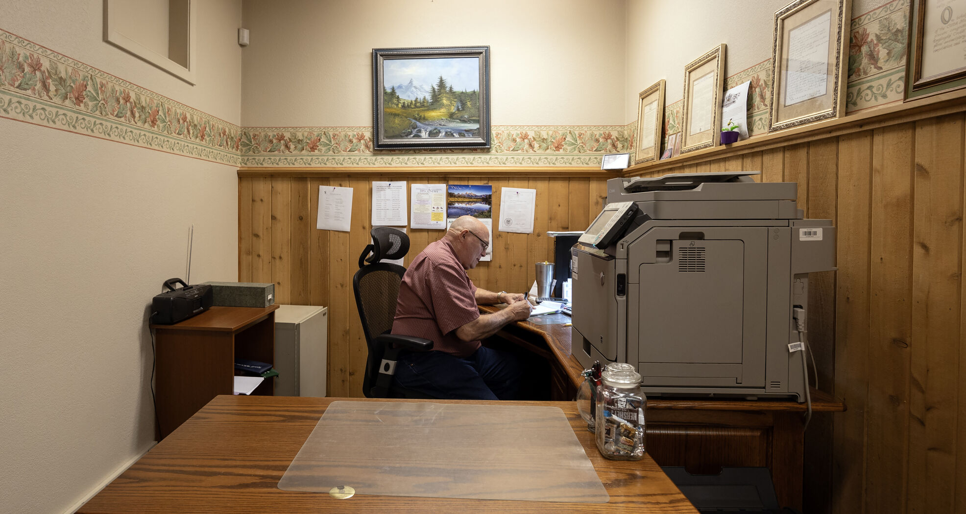 Ray “Butch” Pregler works at his desk at Dubuque Postal Employees Credit Union in Dubuque.    PHOTO CREDIT: Stephen Gassman