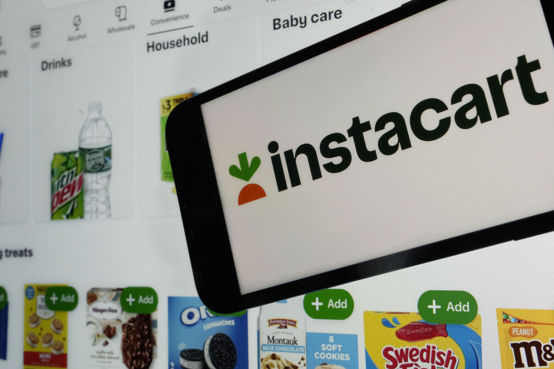 <p>FILE - An instacart logo and an instacart webpage are shown in this photo, in New York, Wednesday, Sept. 6, 2023. nstacart is partnering with Uber Eats to offer restaurant delivery to its customers. Instacart said Tuesday that its U.S. shoppers will see a “Restaurants” tab in the company’s app in the coming weeks. (AP Photo/Richard Drew, File)</p>   PHOTO CREDIT: Richard Drew