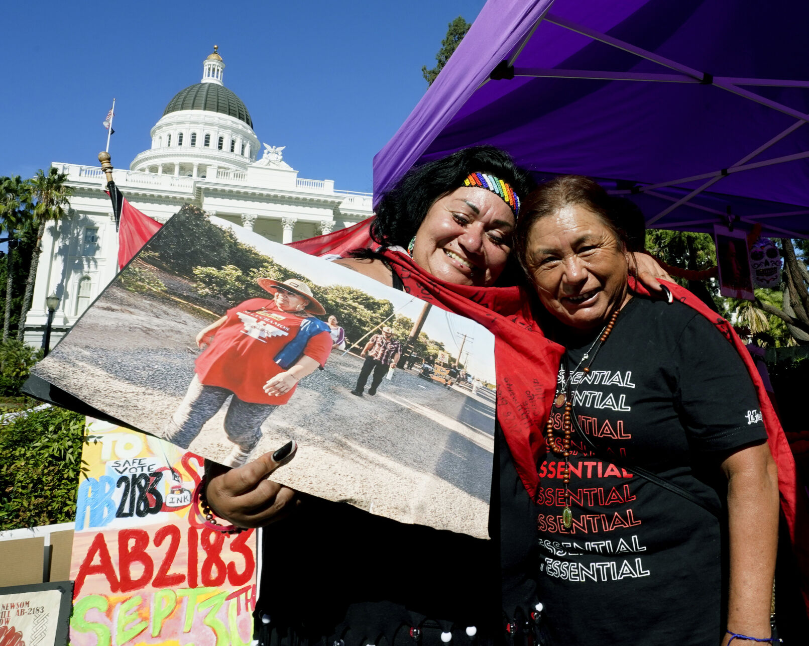 <p>FILE - Farmworkers Cynthia Burgos, left and Teresa Maldonado, right, hug after Gov. Gavin Newsom signed a bill aimed at making it easier for farmworkers to unionize in Sacramento, Calif., Sept. 28, 2022. A battle between The Wonderful Co. which grows pistachios, pomegranates, citrus and other crops and United Farm Workers is over new rules in California aimed at making it easier for farmworkers to form unions. (AP Photo/Rich Pedroncelli, File)</p>   PHOTO CREDIT: Rich Pedroncelli 