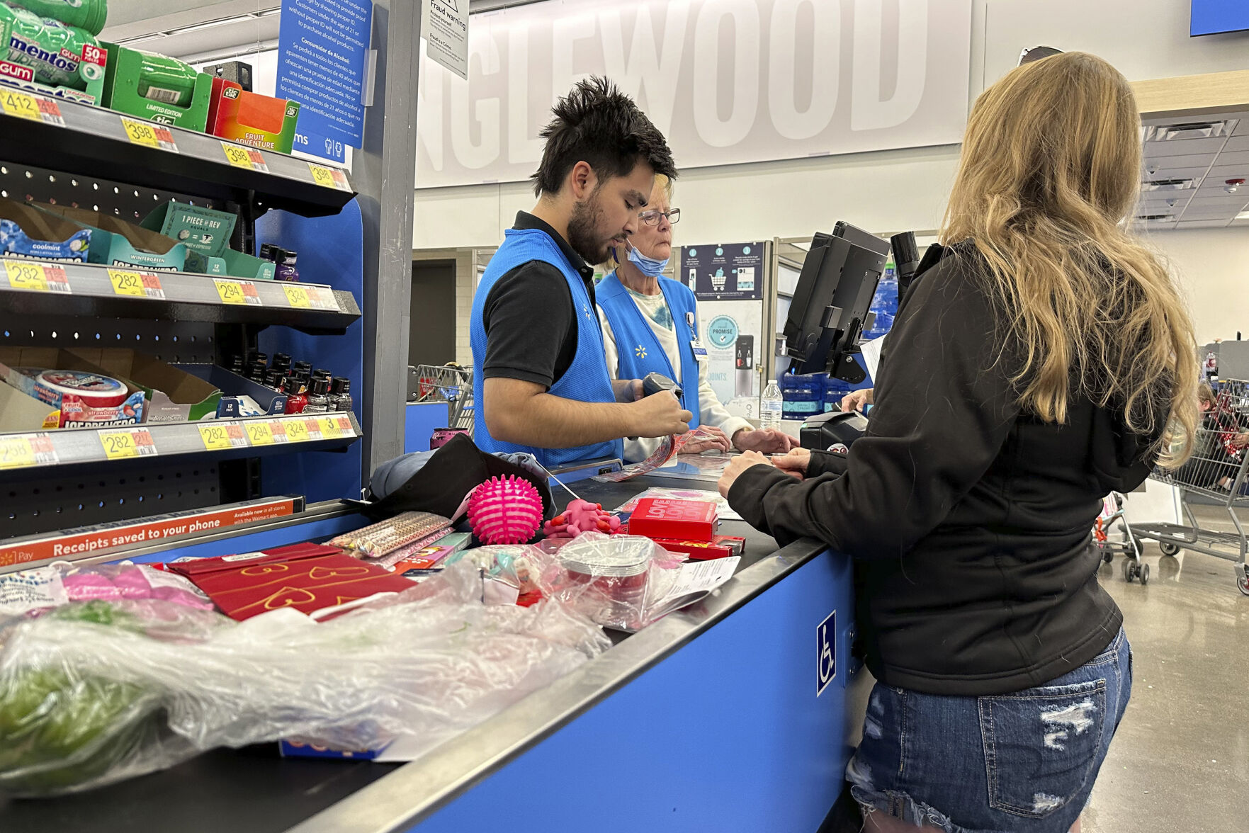 <p>FILE - A customer checks out of a Walmart store Wednesday, Feb. 21, 2024, in Englewood, Colo. On Wednesday, May 15, 2024, the Commerce Department releases U.S. retail sales data for April. (AP Photo/David Zalubowski, File)</p>   PHOTO CREDIT: David Zalubowski - staff, ASSOCIATED PRESS